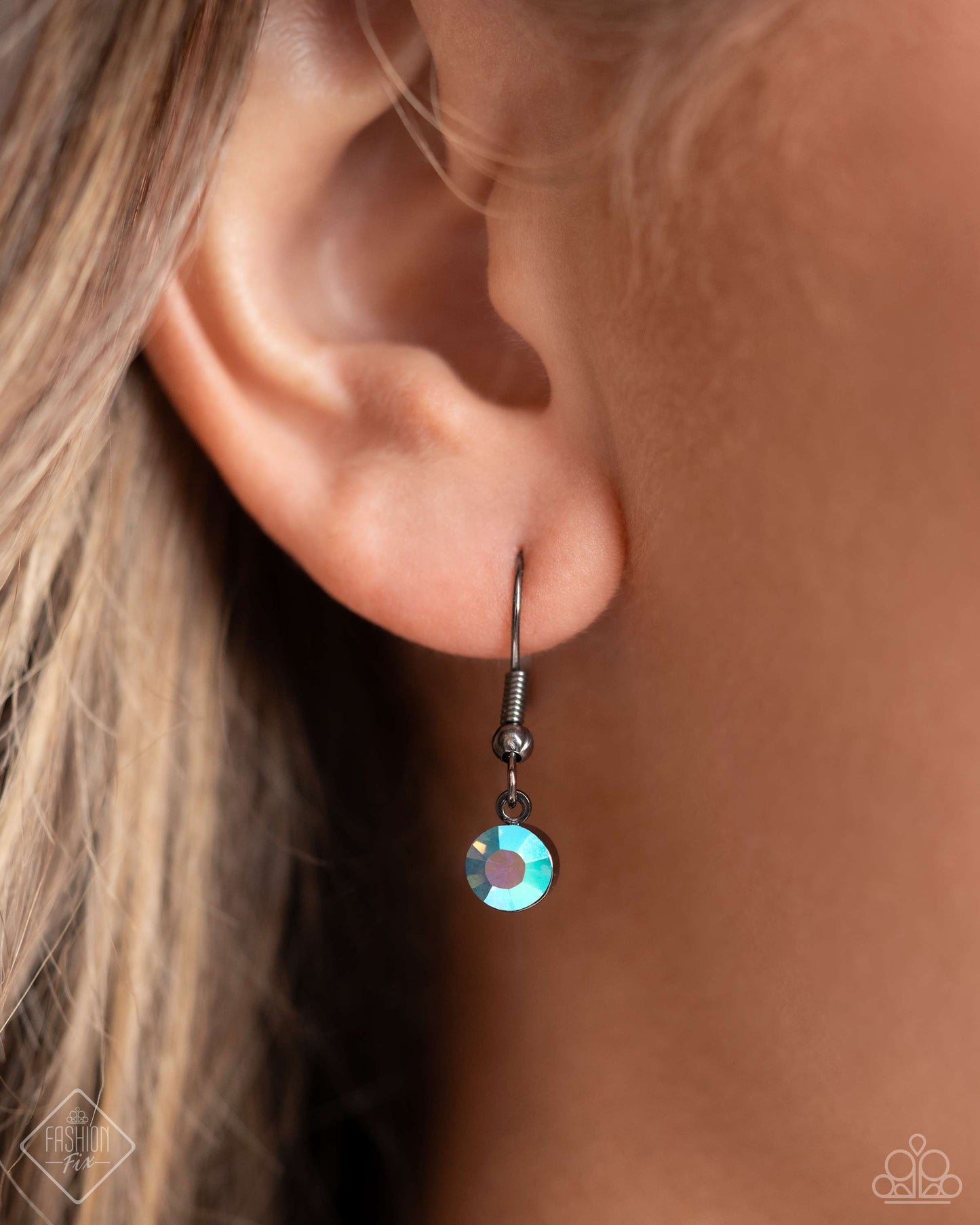 Flair for the Fierce - Blue Item #P2ED-BLXX-047UO A mismatched curb and classic gunmetal chain layer down the chest. A chiseled, see-through, iridescent acrylic bead dangles from the bottom of the uppermost chain, while a sparkly blue UV rhinestone-encrusted gunmetal ornament swings from the lowermost chain for a galactic finish. Features an adjustable clasp closure. Due to its prismatic palette, color may vary. Sold as one individual necklace. Includes one pair of matching earrings.