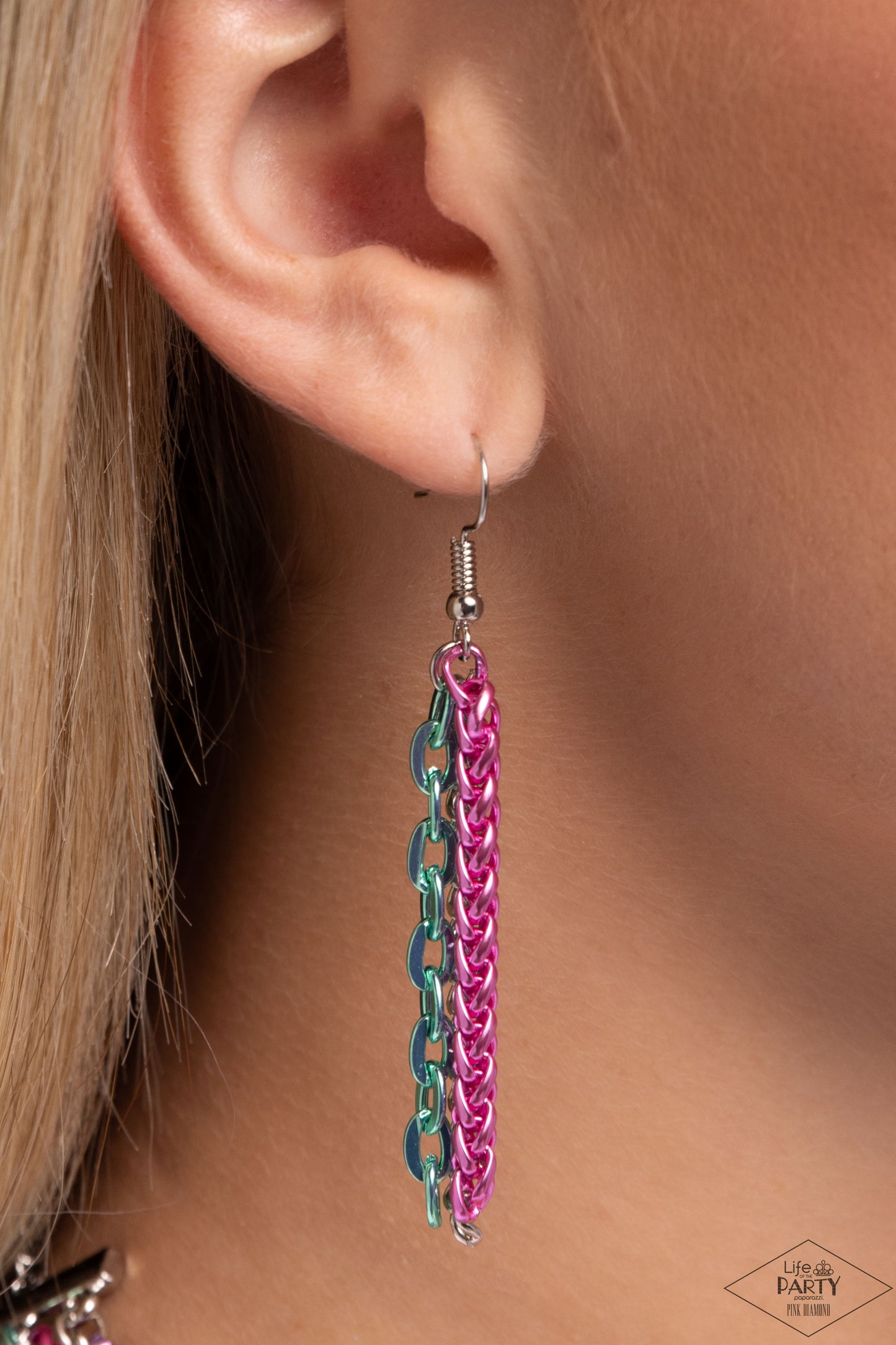 Troublemaker Trove Multi Necklace - Paparazzi Accessories Rows of glistening multicolored chains, multicolored box-chains, and multicolored cable chains drape into endless layers of shimmer down the neckline. A row of classic white rhinestones, pressed into square frames, drips between the bulky layers, adding a dash of sparkle to the industrially colorful palette. Features an adjustable clasp closure. Sold as one individual necklace. Includes one pair of matching earrings. P2IN-MTXX-094XX