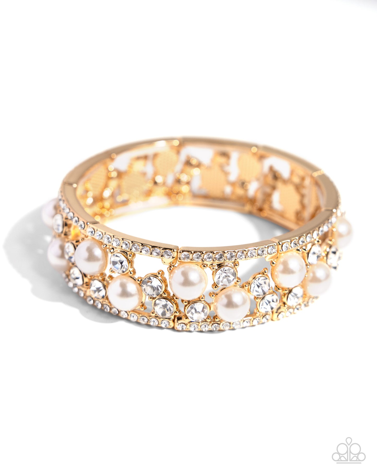 Opera Singer Gold Stretch Bracelet - Paparazzi Accessories Set between white rhinestone-encrusted gold frames, a collection of white gems and white pearls set in gold-pronged fittings scatter and shimmer light around the wrist along elastic stretchy bands for an overly opulent display. Sold as one individual bracelet. P9RE-GDXX-421XX