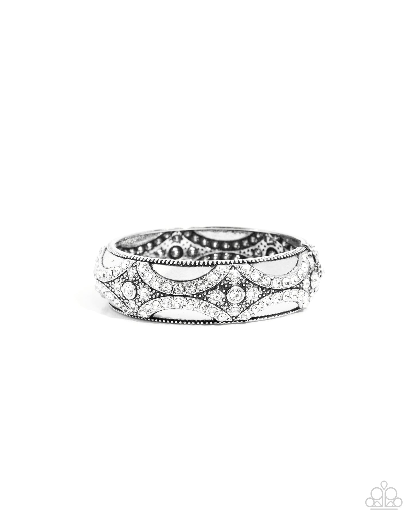 Draped in Decadence White Rhinestone Hinge Bracelet - Paparazzi Accessories Featuring a dazzling array of white rhinestones and silver studs, a refined pattern curls up and along a high-sheen silver cuff. Features a hinged closure. Sold as one individual bracelet. SKU: P9ST-WTXX-060XX