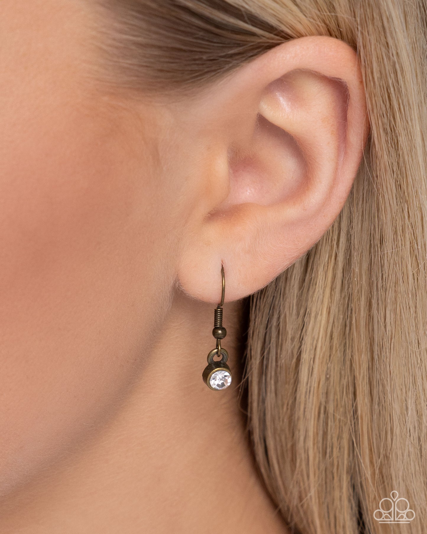 Turtle Tourist Brass Necklace - Paparazzi Accessories Swimming along a dainty brass chain, an oversized brass turtle pendant with a Soft Chambray pearl-painted and white rhinestone embellished shell and eyes shimmers below the neckline for a classic, coastal look. Features an adjustable clasp closure. Sold as one individual necklace. Includes one pair of matching earrings. P2DA-BRXX-154XX