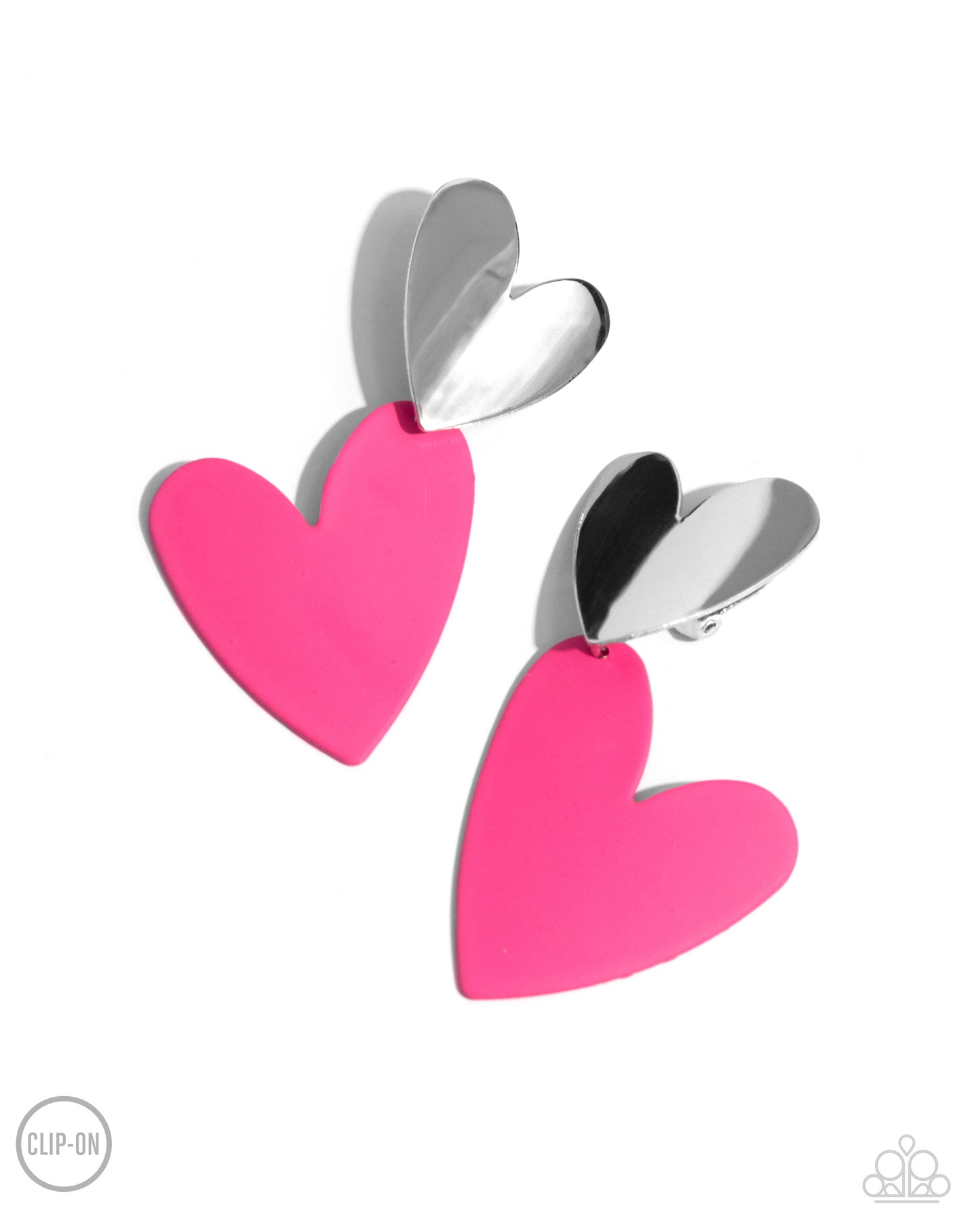 Romantic Occasion Pink Heart Clip-On Earring - Paparazzi Accessories Dangling from a silver heart frame, another heart frame, this time an oversized one, features hot pink paint, creating an attention-grabbing romantic statement below the ear. Earring attaches to a standard clip-on fitting. Sold as one pair of clip-on earrings. P5CO-PKXX-049XX