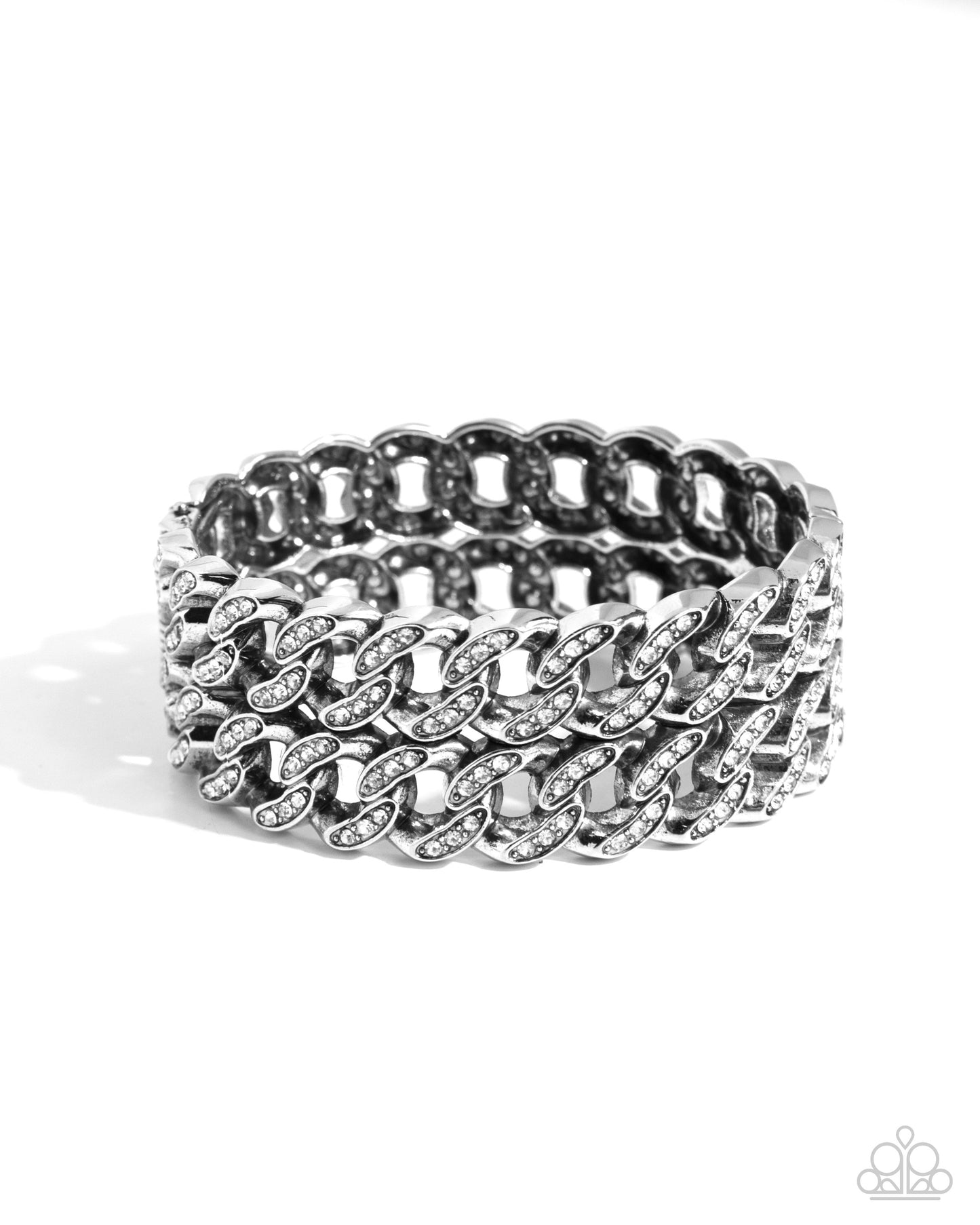 Braided Bandit White Stretch Bracelet - Paparazzi Accessories Embellished with glistening white rhinestones, elongated silver curb chains stack atop one another to create a bold, stackable braided look along the wrist. Sold as one individual bracelet. P9ED-WTXX-060XX