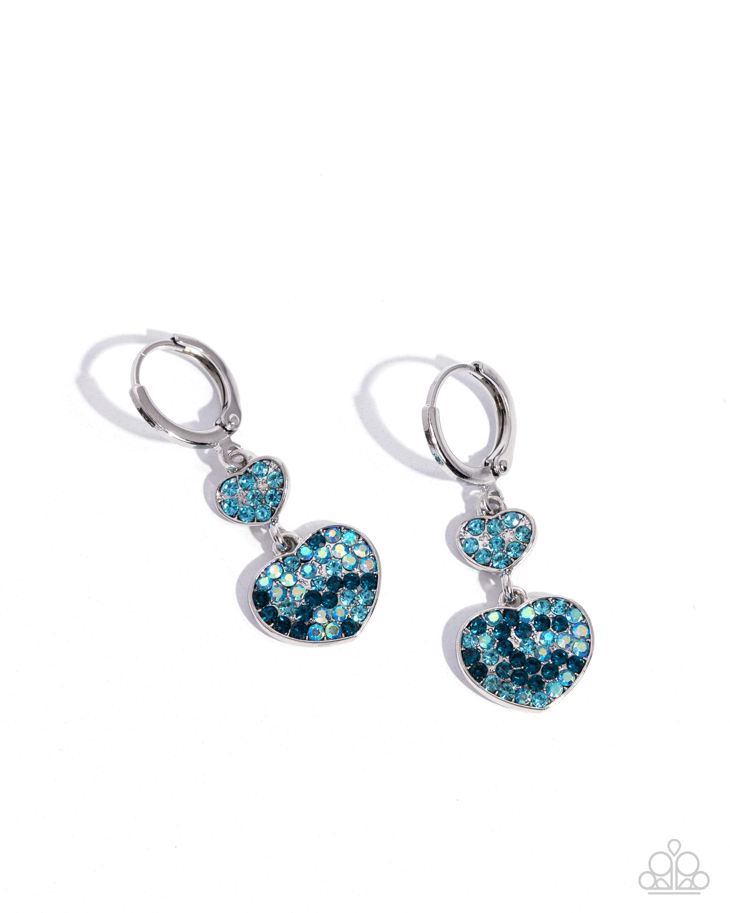 Delightful Valentines Day Blue Heart Hinge Hoop Earring - Paparazzi Accessories Dangling from an aquamarine rhinestone-encrusted silver heart, another heart frame, this time a larger size features aquamarine, blue zircon, and iridescent blue rhinestones, creating an attention-grabbing romantic statement below the ear. Earring attaches to a standard hinge closure fitting. Hoop measures approximately 1/2" in diameter. Due to its prismatic palette, color may vary. P5HO-BLXX-069XX