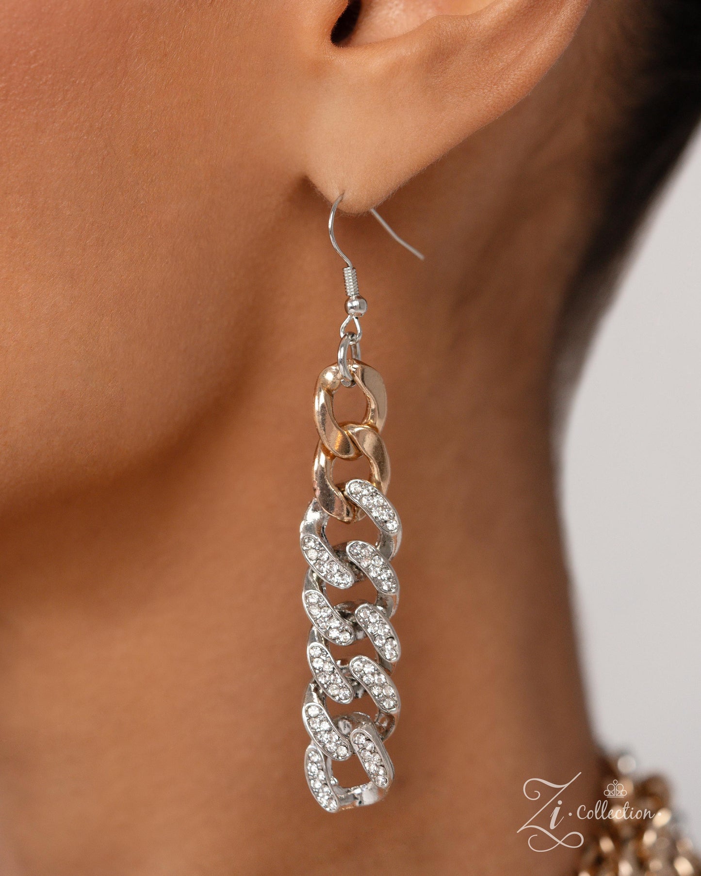 The Melvin Multi 2024 Zi Necklace - Paparazzi Accessories Item #Z2408 A mismatched collection of sleek gold curb chains is layered with silver curb chains to create luminous layers with charismatic chaos. Faceted white rhinestones are sprinkled along the silver chains, adding dramatic flashes of glitz among the mashup of textures. Features an adjustable clasp closure. Sold as one individual necklace. Includes one pair of matching earrings. Named after the 2024 Seize the Spotlight winner, Melvin B.