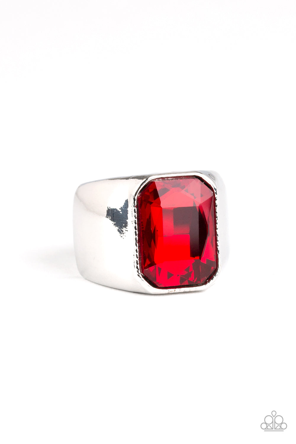 Scholar - Red Featuring a kingly emerald style cut, an oversized red rhinestone is pressed into the center of a glistening silver band for a statement look. Features a stretchy band for a flexible fit. Sold as one individual ring.