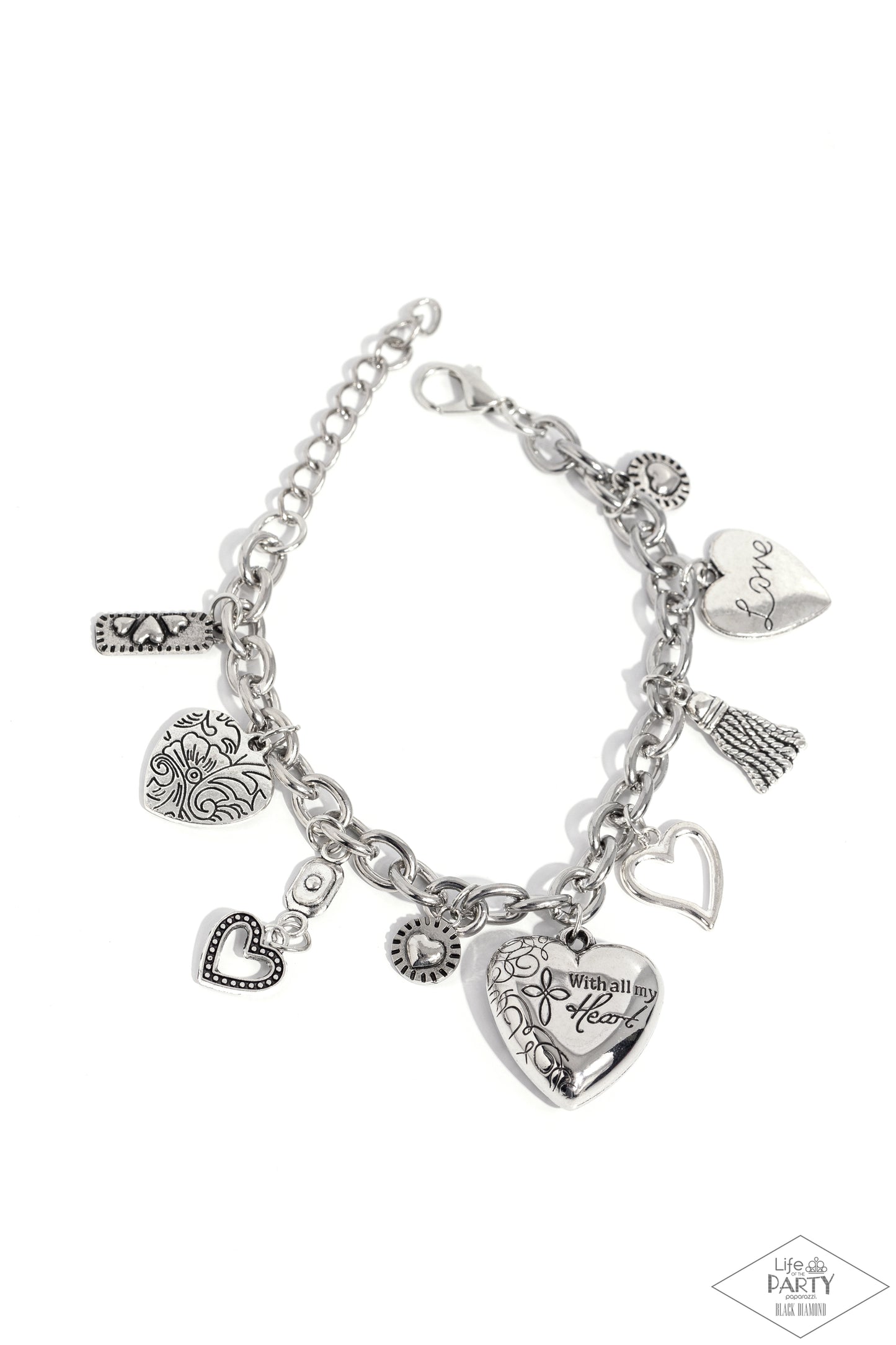 Pure In Heart Silver Inspirational Clasp Bracelet - Paparazzi Accessories An array of silver heart charms trickle from a section of bold silver chain, creating a whimsical fringe around the wrist. The largest heart charm is inscribed with the phrase, “With all my heart” on one side and a short bible verse on the other that reads, "Love the Lord your God with all your heart. Luke 10:27.” Features an adjustable clasp closure. Sold as one individual bracelet. P9WH-SVXX-112XX