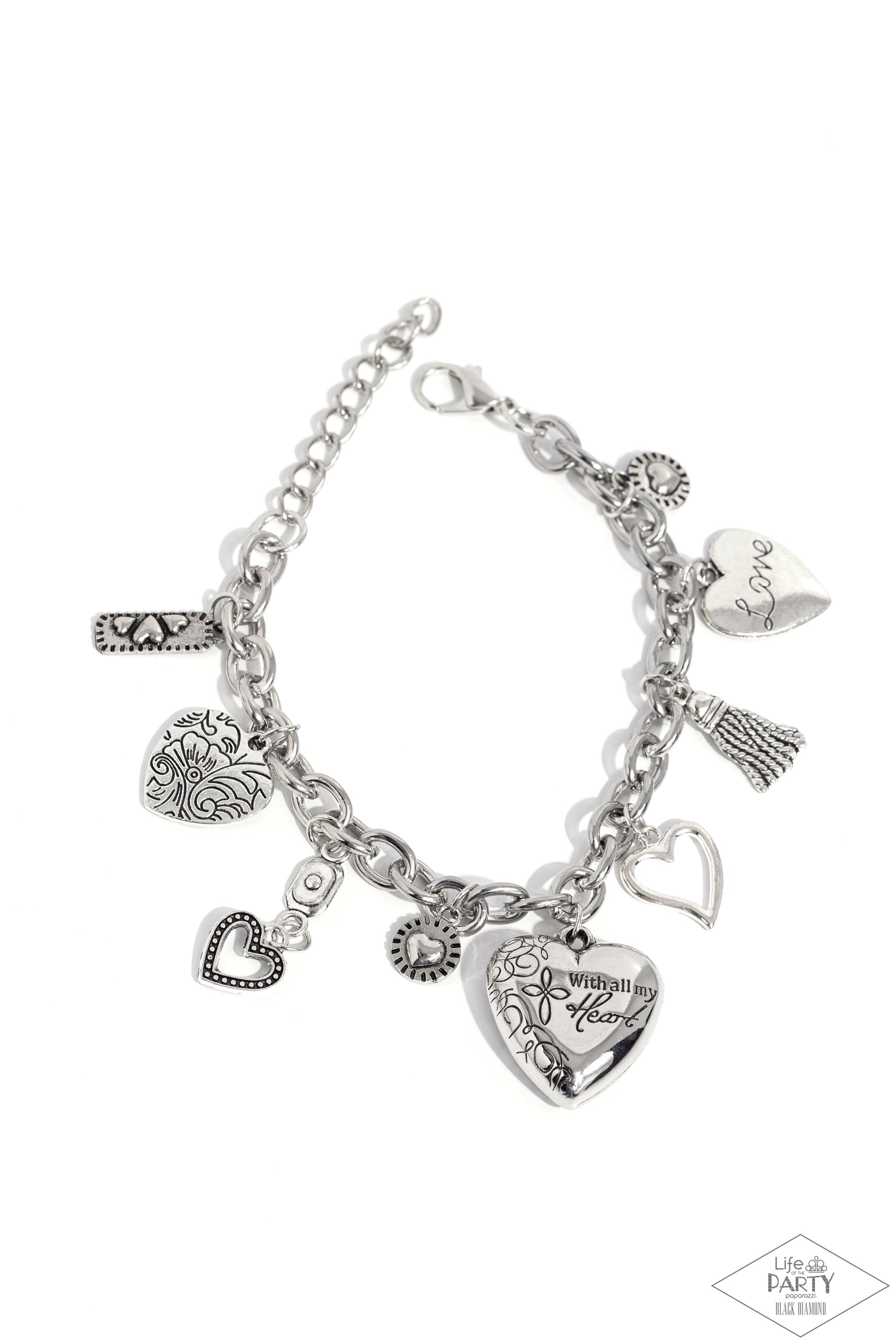 Pure In Heart Silver Inspirational Clasp Bracelet - Paparazzi Accessories  An array of silver heart charms trickle from a section of bold silver chain, creating a whimsical fringe around the wrist. The largest heart charm is inscribed with the phrase, “With all my heart” on one side and a short bible verse on the other that reads, "Love the Lord your God with all your heart. Luke 10:27.” Features an adjustable clasp closure.  Sold as one individual bracelet.  P9WH-SVXX-112XX