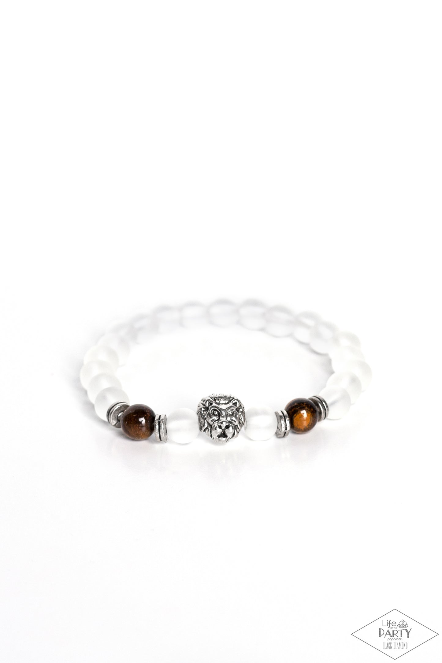 The Lions Share Brown Bracelet - Paparazzi Accessories Infused with a silver lion charm, glassy white and energetic tiger's eye stones are threaded along a stretchy elastic band for a seasonal look. Sold as one individual bracelet. P9SE-URBN-269XX. This Black Diamond Encore is back in the spotlight at the request of our 2022 Life of the Party member with Black Diamond Access, Monica Cox