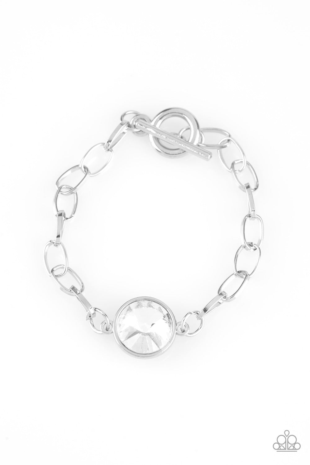 All Aglitter White Toggle Bracelet - Paparazzi Accessories A dramatic white gem attaches to a shiny silver chain, creating a blinding centerpiece atop the wrist. Features a toggle closure. All Paparazzi Accessories are lead free and nickel free! Sold as one individual bracelet. Get The Complete Look! Necklace: "She Sparkles On - White" (Sold Separately)