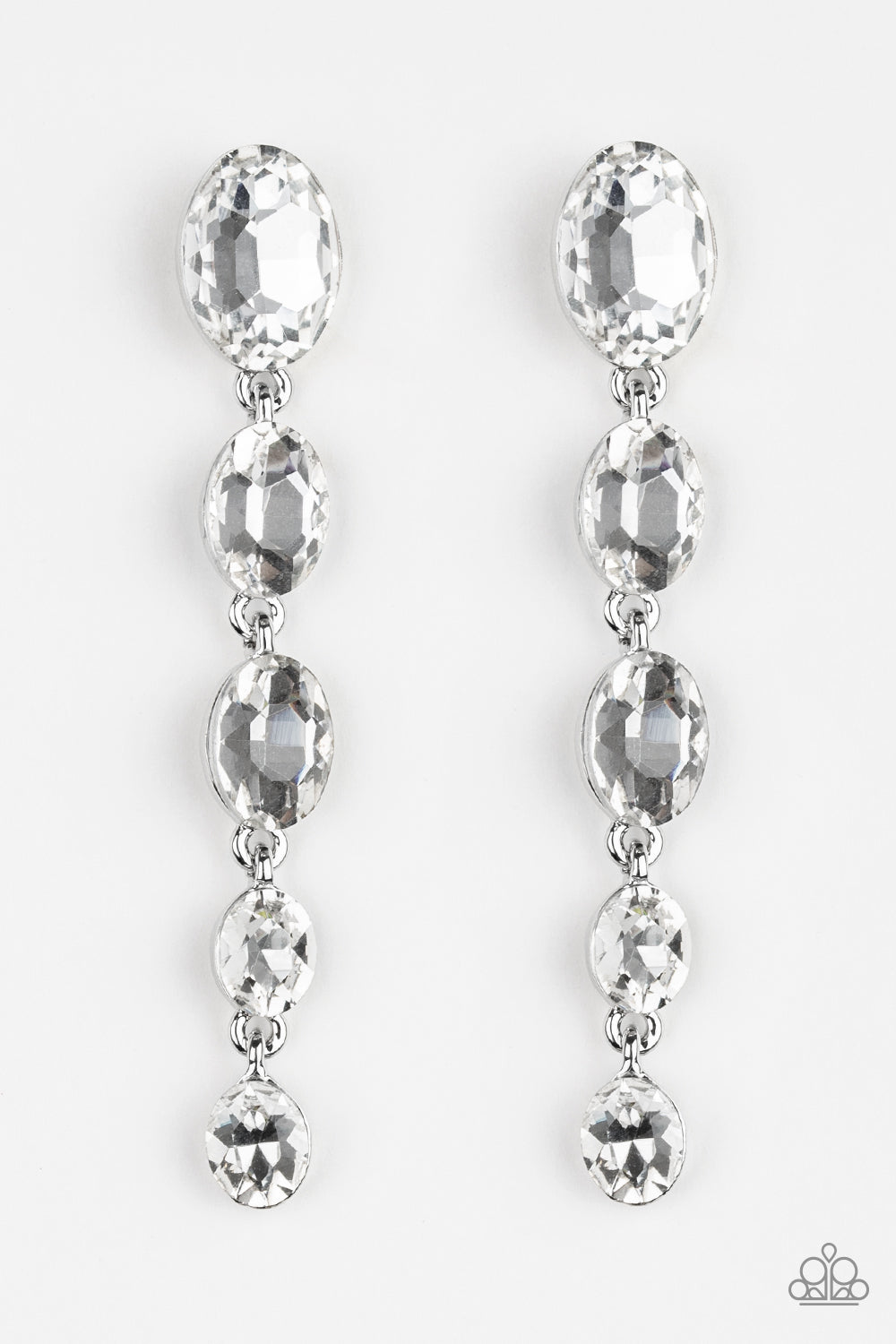 Red Carpet Radiance White Rhinestone Post Earring - Paparazzi Accessories Gradually decreasing in size, glittery white gems trickle from the ear in a glamorous fashion. Earring attaches to a standard post fitting. Sold as one pair of post earrings.