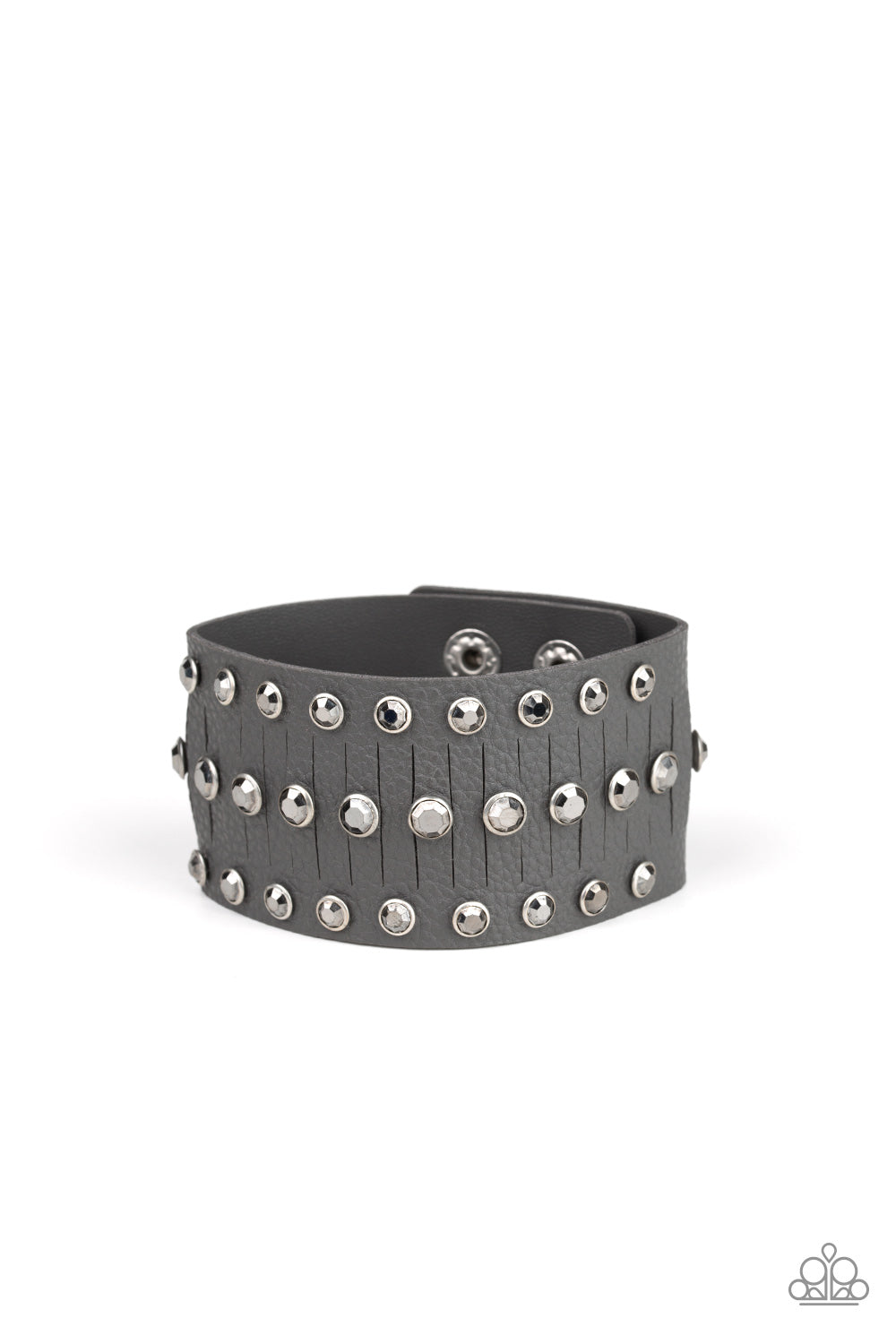 Now Taking The Stage Silver Wrap Bracelet - Paparazzi Accessories Pressed into sleek silver frames, glittery hematite rhinestones are studded across a thick gray leather band featuring a center lined with slits for a sassy finish. Features an adjustable snap closure. All Paparazzi Accessories are lead free and nickel free! Sold as one individual bracelet.