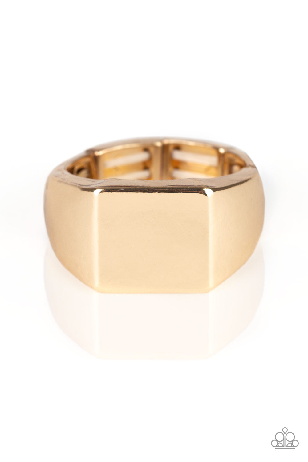 Void Gold Urban Ring - Paparazzi Accessories The center of a thick gold band has been smashed into a flat square center for a casual look. Features a shortened stretchy band for a flexible fit. Intended to be worn on the pinky finger. Sold as one individual ring.
