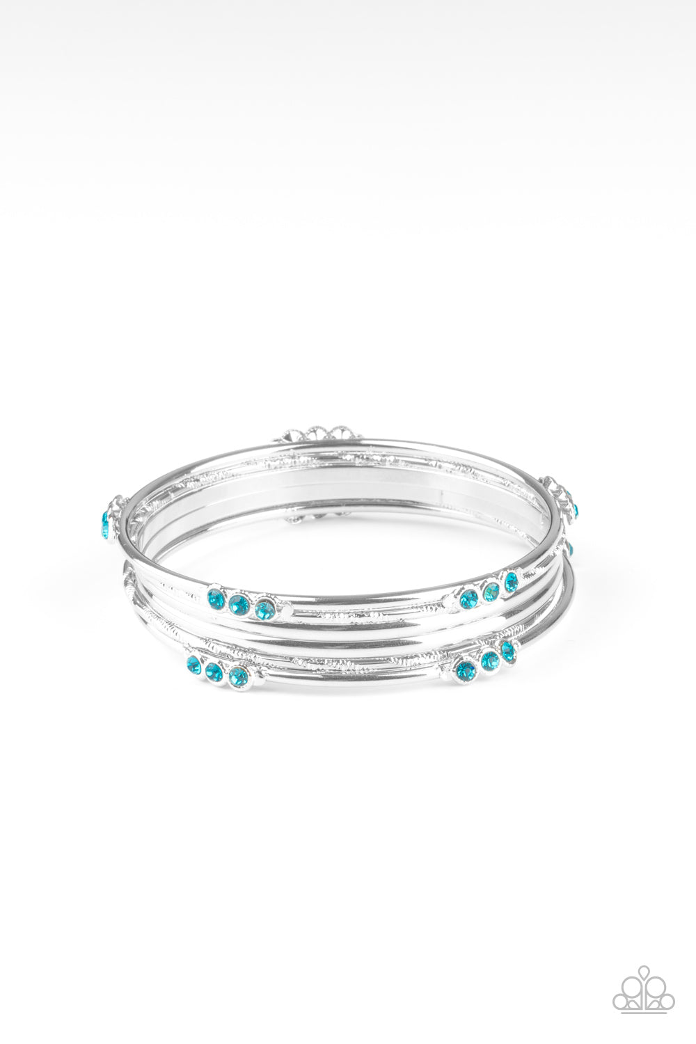 Stackable Sparkle Blue Bracelet - Paparazzi Accessories Pairs of plain, textured, and blue rhinestone adorned silver bangles glide along the wrist for a sparkly look. All Paparazzi Accessories are lead free and nickel free! Sold as one set of six bracelets.