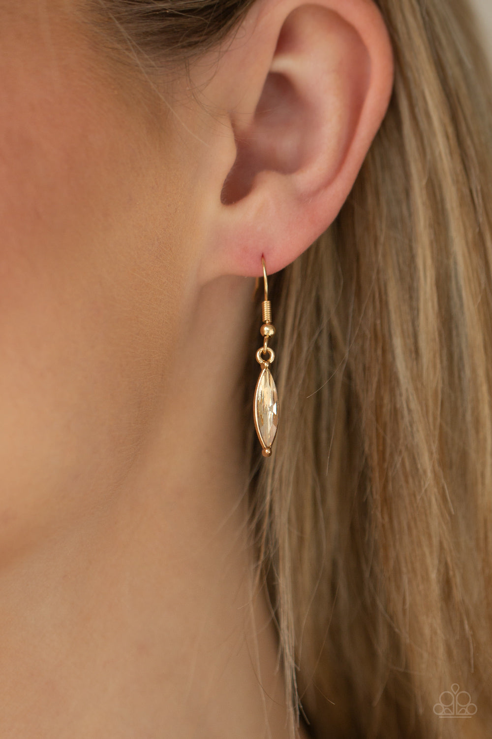 Flight of FANCINESS Gold Necklace - Paparazzi Accessories A glittery collection of golden marquise rhinestones delicately connect into a twinkly feather, creating a sparkly stationary pendant below the collar. Features an adjustable clasp closure. All Paparazzi Accessories are lead free and nickel free! Sold as one individual necklace. Includes one pair of matching earrings.