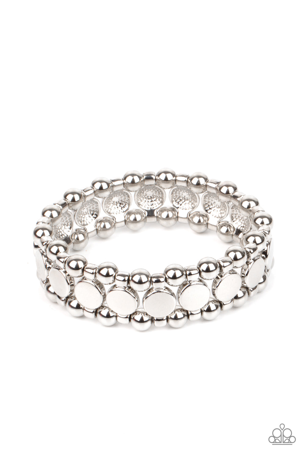 Metro Magnetism Silver Bracelet - Paparazzi Accessories Shiny silver disc fittings and pairs of classic silver beads are threaded along stretchy bands around the wrist that connect into a bold industrial display around the wrist. All Paparazzi Accessories are lead free and nickel free! Sold as one individual bracelet.