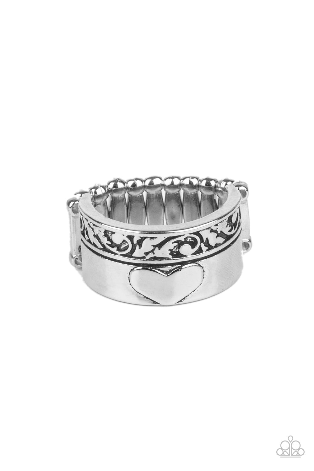 Garden Romance Silver Ring - Paparazzi Accessories Bordered in a leafy embossed trim, a thick silver band is embossed in a heart for a vintage inspired look. Features a stretchy band for a flexible fit. All Paparazzi Accessories are lead free and nickel free! Sold as one individual ring.