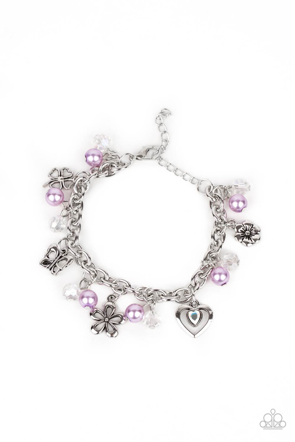 Retreat into Romance Purple Charm Bracelet - Paparazzi Accessories. Infused with purple pearls and iridescent crystal-like beads, mismatched silver charms including a clover, butterfly, heart, and floral frames swing from a chunky silver chain around the wrist. Features an adjustable clasp closure. All Paparazzi Accessories are lead free and nickel free! Sold as one individual bracelet.