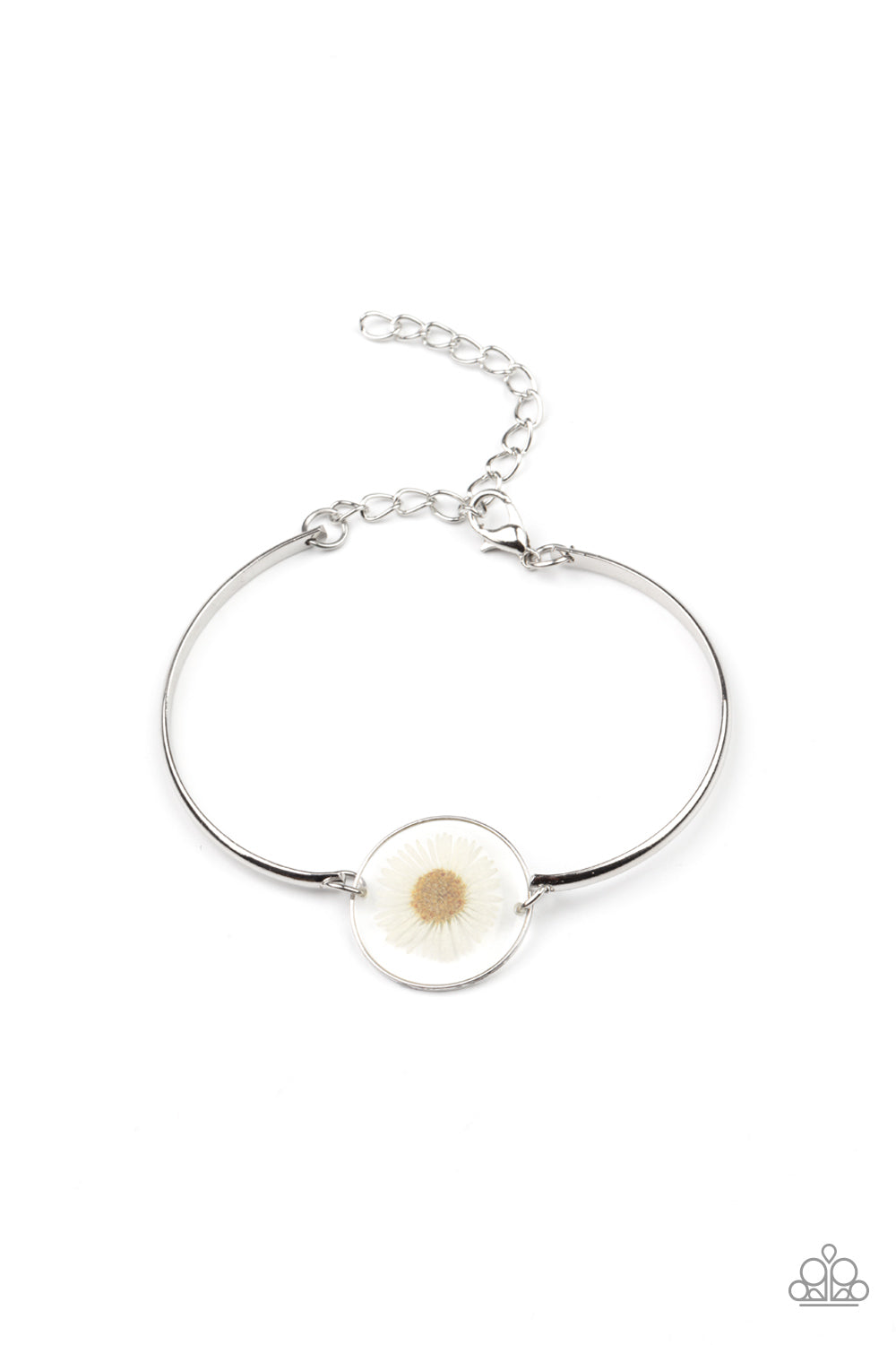 Cottage Season White Bracelet - Paparazzi Accessories. Encased in a glassy fitting, a whimsical white daisy centerpiece attaches to two arcing silver bars around the wrist for an enchanting floral look. Features an adjustable clasp closure. All Paparazzi Accessories are lead free and nickel free! Sold as one individual bracelet.