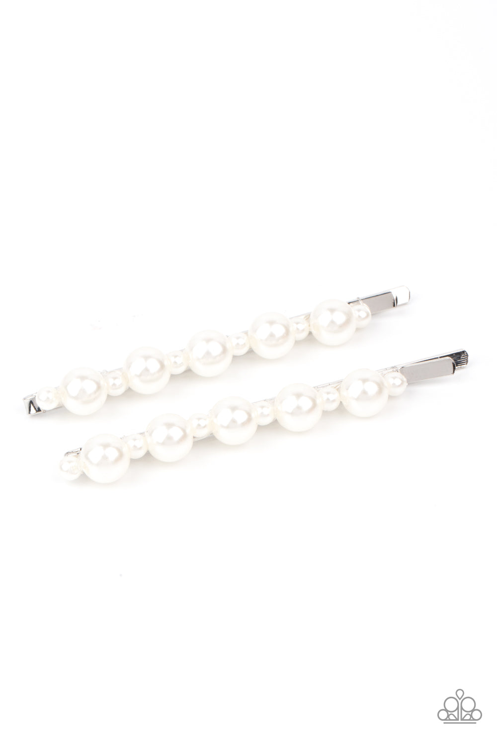 Put A Pin In It White Hair Clip - Paparazzi Accessories. Dainty and classic pearls alternate along a pair of silver bobby pins, creating a bubbly display. All Paparazzi Accessories are lead free and nickel free! Sold as one pair of decorative bobby pins.