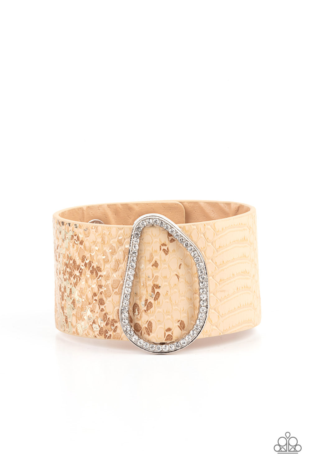 HISS-tory In The Making Brown Wrap Bracelet - Paparazzi Accessories Encrusted with glassy white rhinestones, an asymmetrical silver fitting glides along a tan leather band adorned in a golden metallic python print for a wild look. Features an adjustable snap closure. All Paparazzi Accessories are lead free and nickel free! Sold as one individual bracelet.
