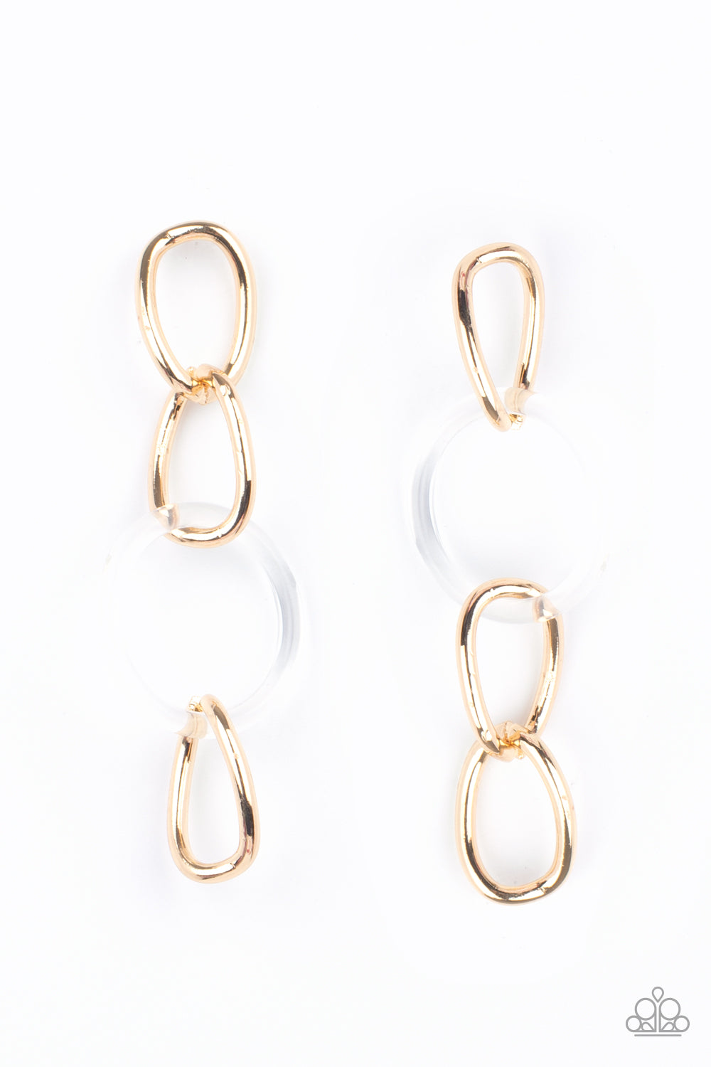 Talk In Circles Gold Earring - Paparazzi Accessories Bright gold oversized links, interrupted by a single large clear acrylic ring, fall from the ear in linked succession for an on-trend fashion statement. Earring attaches to a standard post fitting. All Paparazzi Accessories are lead free and nickel free! Sold as one pair of post earrings.
