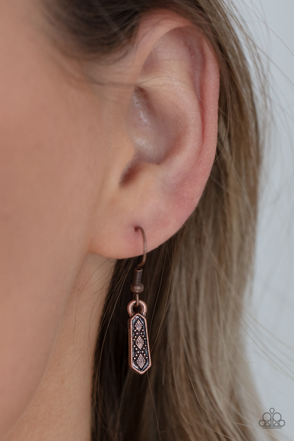 Monumental March Copper Necklace - Paparazzi Accessories A row of copper obelisk-like monuments gradually decrease in size as they fan out across the collar. Delicately embossed with textured diamond shapes, they march along a dainty round copper chain. Features an adjustable clasp closure. All Paparazzi Accessories are lead free and nickel free! Sold as one individual necklace. Includes one pair of matching earrings.