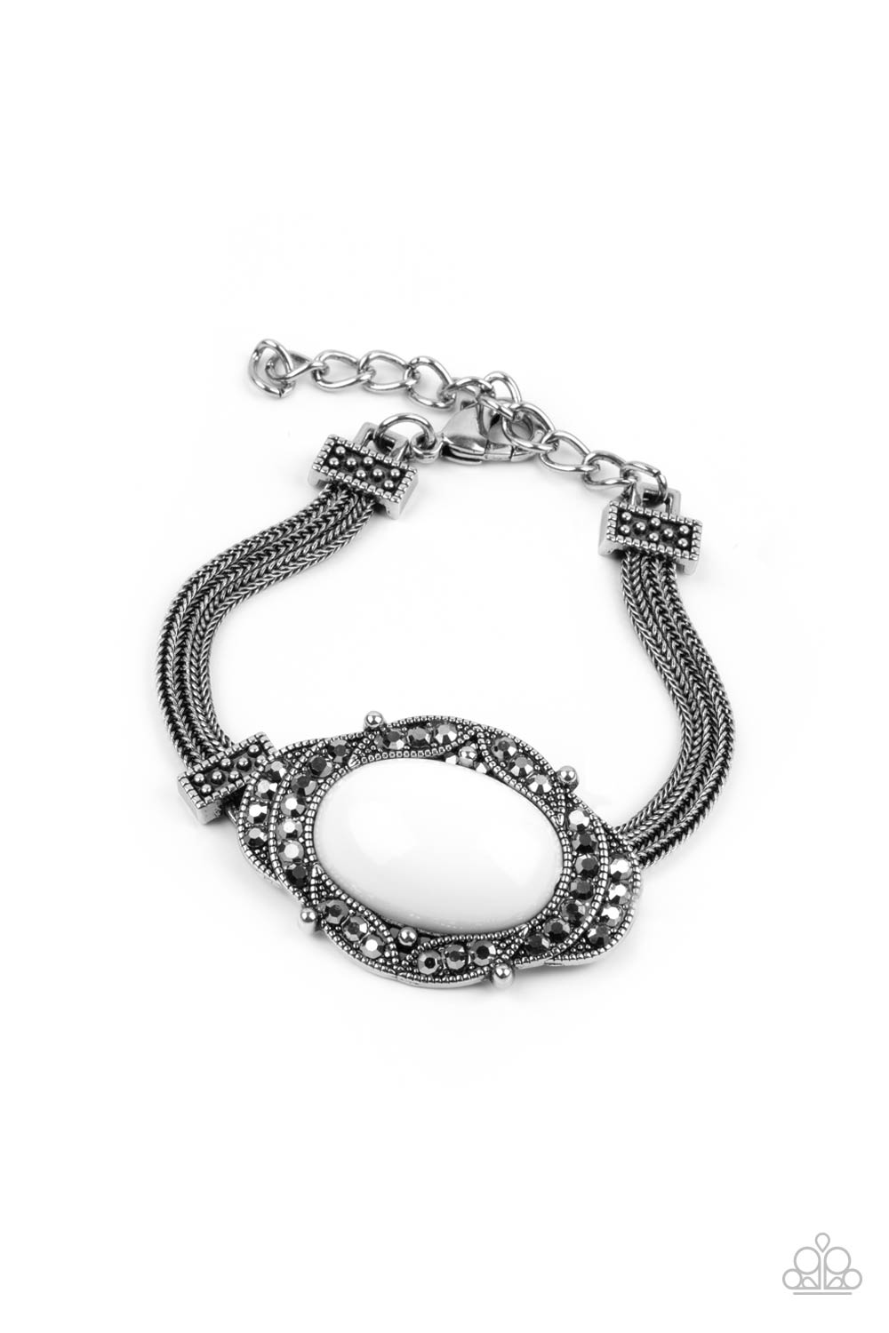 Top-Notch Drama White Bracelet - Paparazzi Accessories Hematite encrusted silver frames delicately overlap around an oval white bead, creating an edgy centerpiece. The colorful centerpiece attaches to strands of ornate silver chains that are held in place around the wrist by studded silver frames. Features an adjustable clasp closure. All Paparazzi Accessories are lead free and nickel free! Sold as one individual bracelet.