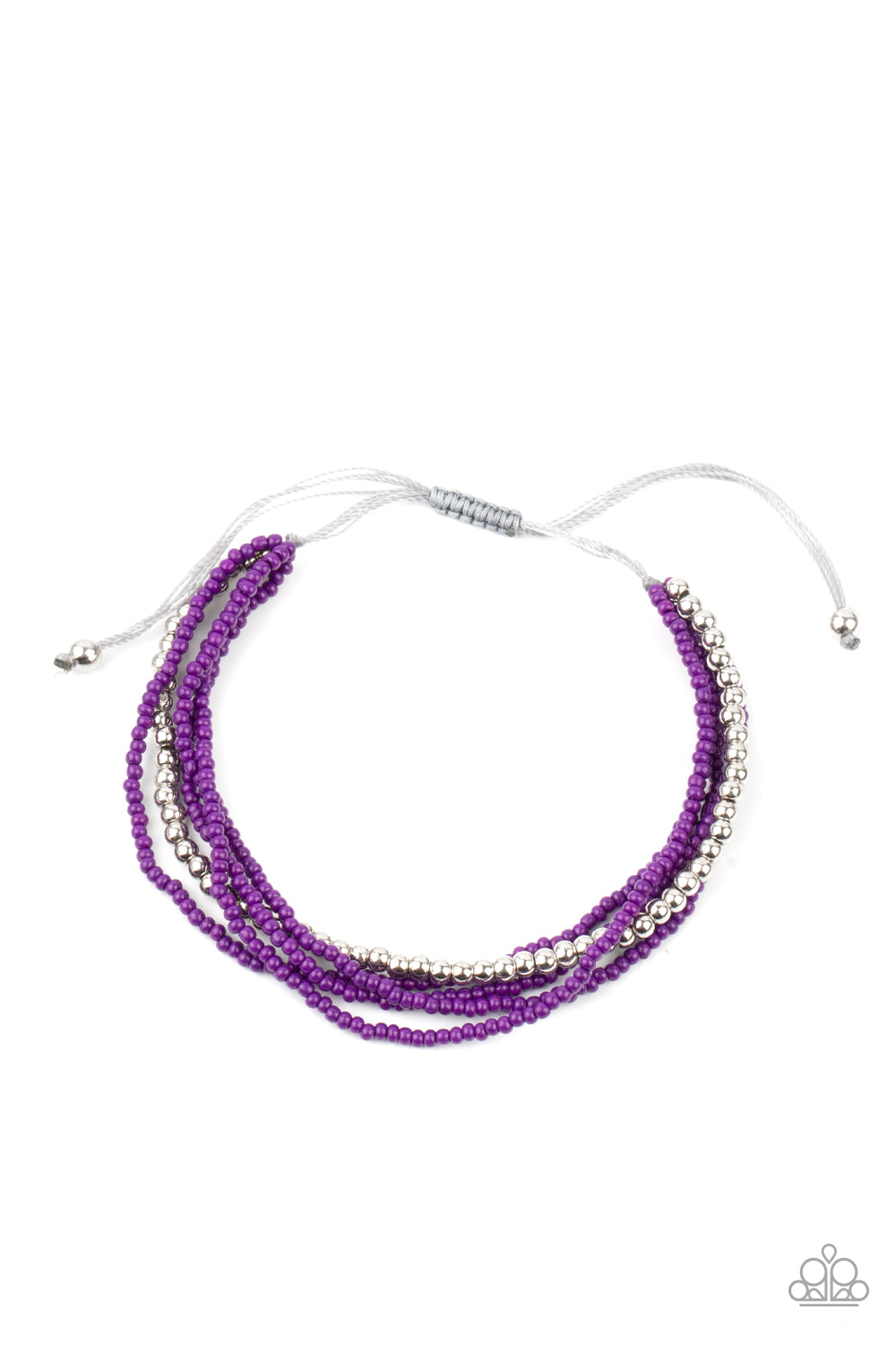 All Beaded Up Purple Seed Bead Bracelet - Paparazzi Accessories A single accent strand of silver beads merges with multiple strands of purple seed beads for a simple yet trendy look. Features an adjustable sliding knot closure. All Paparazzi Accessories are lead free and nickel free! Sold as one individual bracelet.