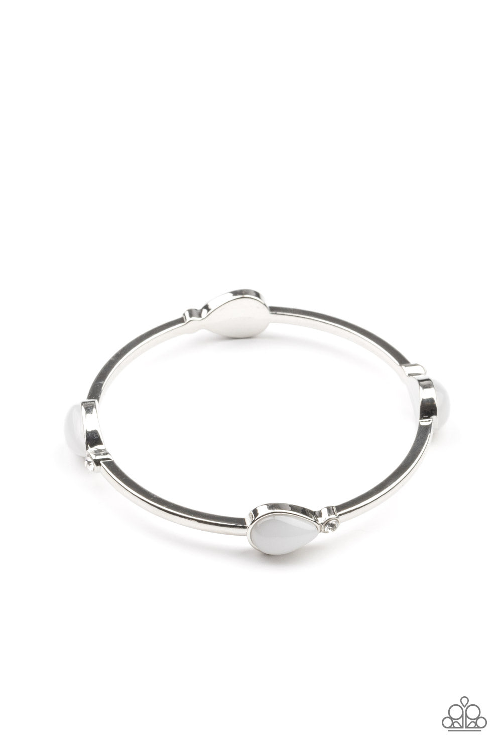 Dewdrop Dancing White Bracelet - Paparazzi Accessories Pairs of glassy white teardrops and dainty white rhinestones embellish a classic silver bangle, creating a dreamy display around the wrist. All Paparazzi Accessories are lead free and nickel free! Sold as one individual bracelet.