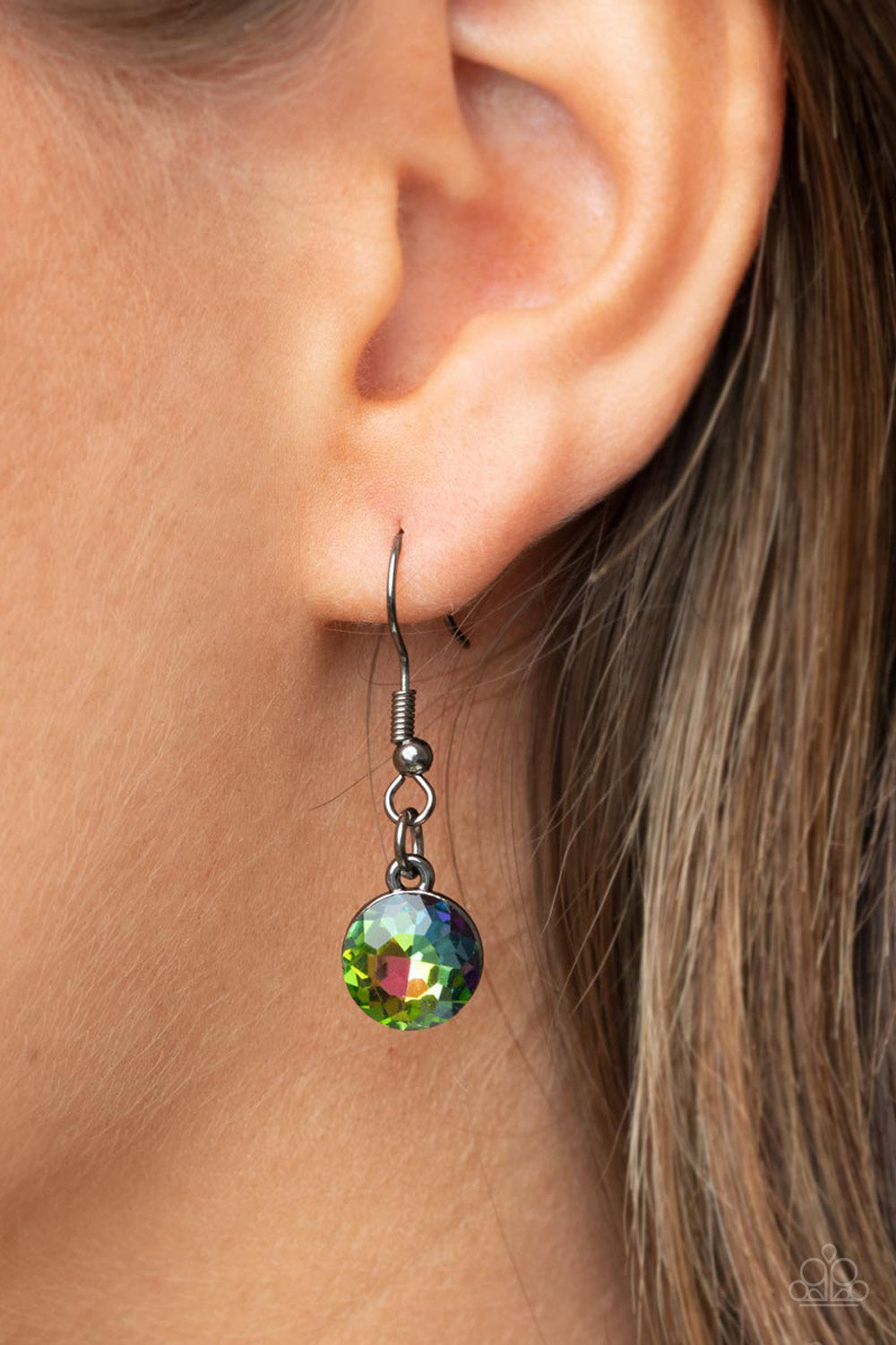 Unfiltered Confidence Multi Oil Spill Necklace - Paparazzi Accessories A trio of brilliant oil spill square gut gems encased in classic gunmetal fittings takes center stage. Teardrop and round oil spill gems link to a gunmetal chain on either side of the trio for a striking display below the collar. Features an adjustable clasp closure. All Paparazzi Accessories are lead free and nickel free! Sold as one individual necklace. Includes one pair of matching earrings.