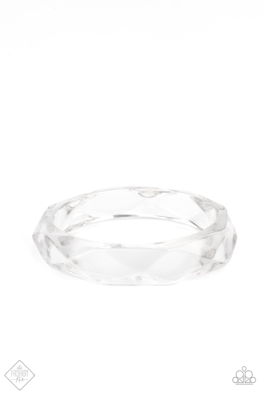 Clear-Cut Couture White Bange Bracelet - Paparazzi Accessories Featuring a flashy faceted surface, an oversized crystal-like acrylic bangle glides along the wrist, casting rainbow reflections with its glassy exterior. All Paparazzi Accessories are lead free and nickel free! Sold as one individual bracelet. Get The Complete Look! Earring: "Clear-Cut Couture - White" (Sold Separately)