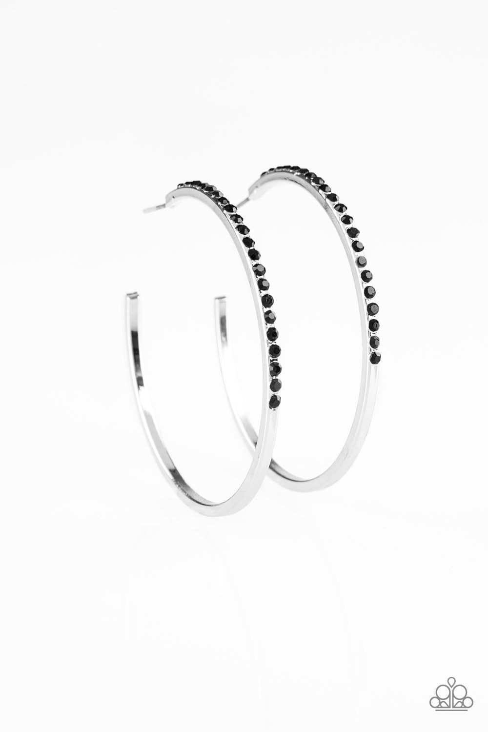 Chic Classic - Black Item #E350 The front of a silver hoop is encrusted in glittery black rhinestones for a glamorous look. Earring attaches to a standard post fitting. Hoop measures 2" in diameter. All Paparazzi Accessories are lead free and nickel free! Sold as one pair of hoop earrings.