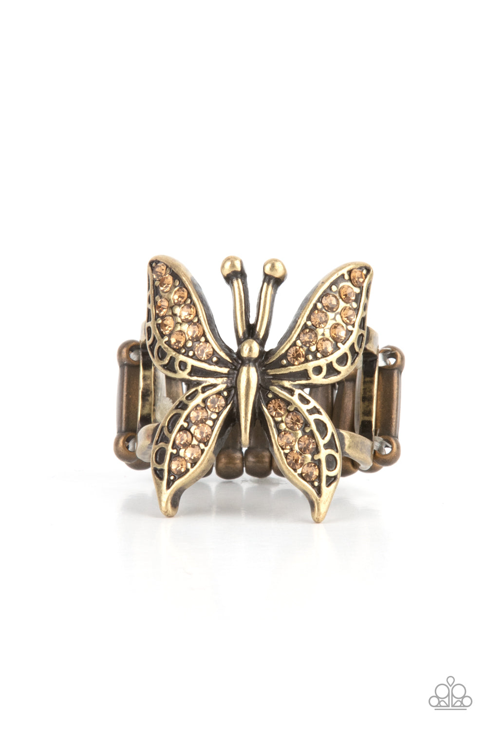 Blinged Out Butterfly Brass Ring - Paparazzi Accessories Glittery sections of topaz rhinestones delicately encrusted the decorative wings of a brass butterfly, creating a whimsically fluttering centerpiece atop the finger. Features a stretchy band for a flexible fit. Sold as one individual ring.
