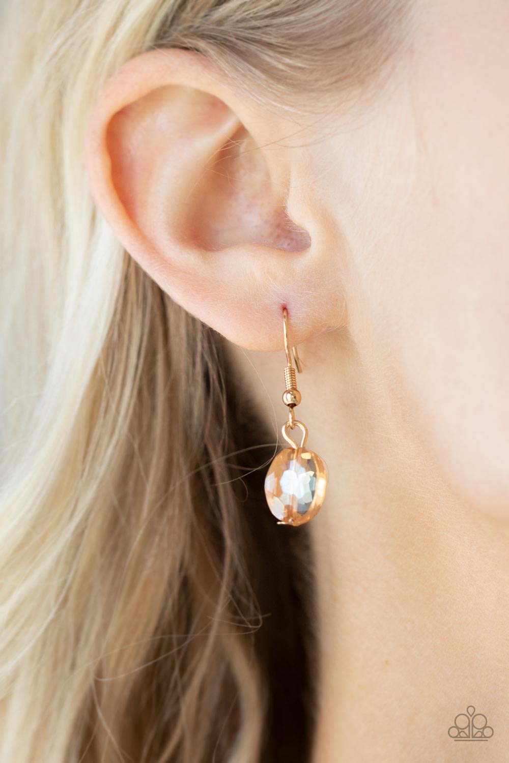 Cosmic Closeup Gold Necklace - Paparazzi Accessories Brushed in an iridescent finish, a faceted collection of oversized golden gems delicately links below the collar for a gritty glamorous look. Features an adjustable clasp closure. All Paparazzi Accessories are lead free and nickel free! Sold as one individual necklace. Includes one pair of matching earrings.