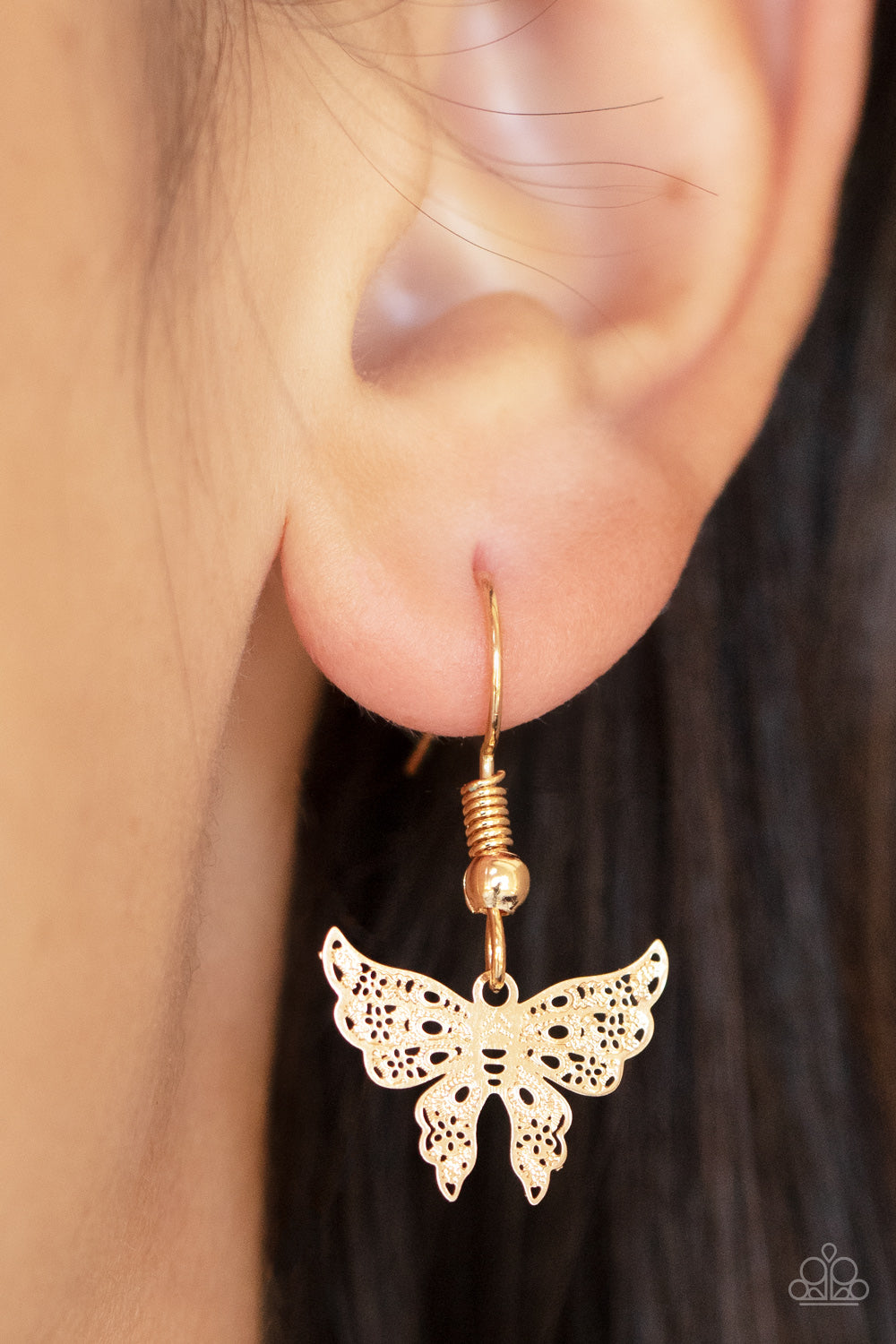 Bountiful Butterflies Gold Necklace - Paparazzi Accessories Dotted with a dainty white rhinestone, a decoratively layered gold butterfly swings from the bottom of a display of mismatched gold chains for a whimsically fluttering fashion. Features an adjustable clasp closure. Sold as one individual necklace. Includes one pair of matching earrings.