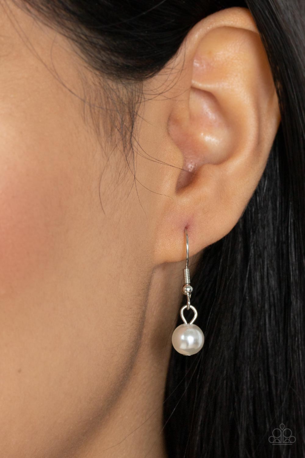 Drip Drop Dazzle White Necklace - Paparazzi Accessories Featuring an iridescent shimmer, a dramatically oversized crystal-like teardrop swings from the bottom of a cluster of shiny silver, pearly white, and crystal-like beads, creating a dazzling pendant at the bottom of a lengthened silver chain. Features an adjustable clasp closure. Sold as one individual necklace. Includes one pair of matching earrings.