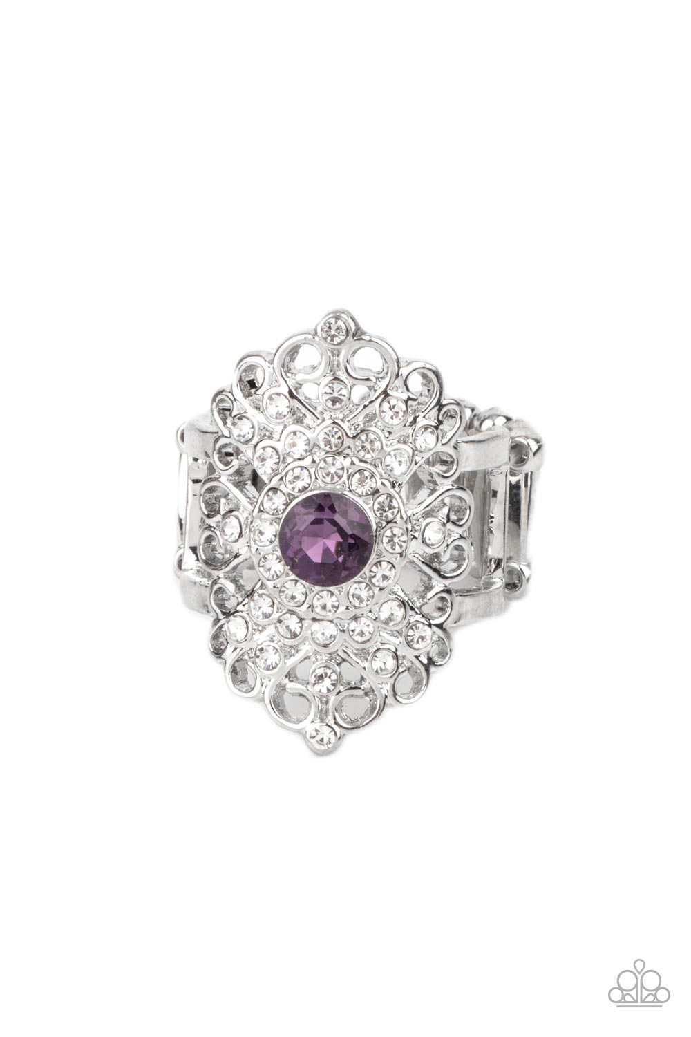 Dining with Royalty Purple Ring - Paparazzi Accessories A glittery purple rhinestone adorns the center of a frilly silver backdrop adorned in dainty white rhinestones, creating a regal centerpiece atop the finger. Features a stretchy band for a flexible fit. All Paparazzi Accessories are lead free and nickel free! Sold as one individual ring.