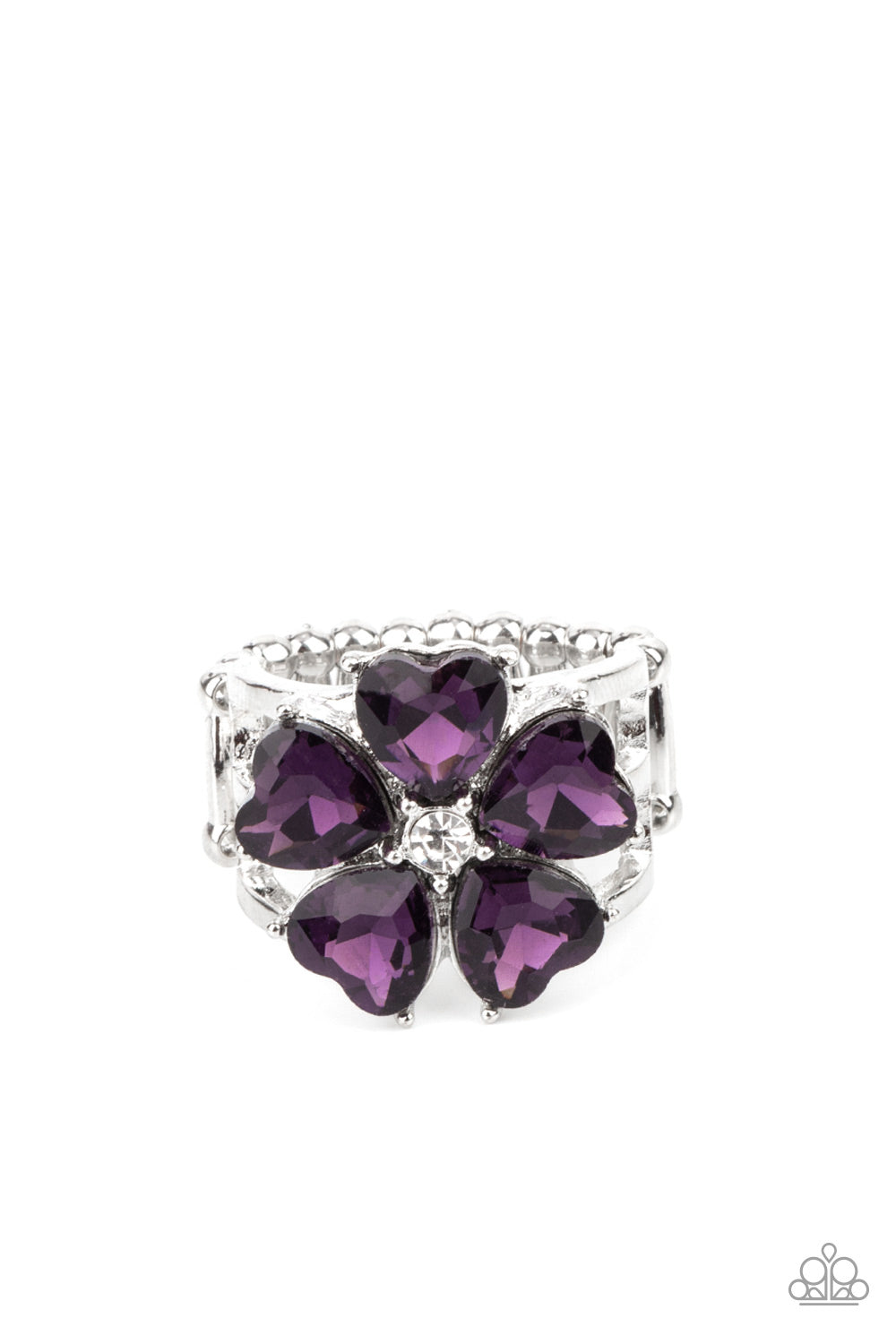 Minnesota Magic Purple Ring - Paparazzi Accessories Glittery heart-shaped purple rhinestones bloom from a dainty white rhinestone center, creating a sparkly floral centerpiece atop layered silver bands. Features a stretchy band for a flexible fit. Sold as one individual ring.