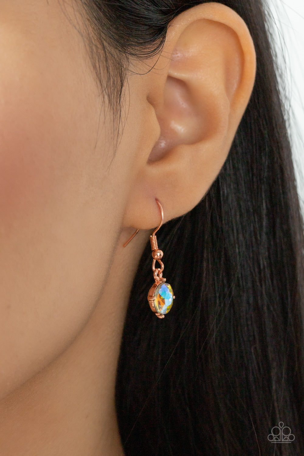 Lavishly Loaded Copper Necklace - Paparazzi Accessories A glittering collection of marquise and round peach-colored gems encased in studded copper fittings, coalesce into a lavish frame that gives way to a classic shiny copper chain resulting in a glamorous finish below the collar. Features an adjustable clasp closure. All Paparazzi Accessories are lead free and nickel free! Sold as one individual necklace. Includes one pair of matching earrings.