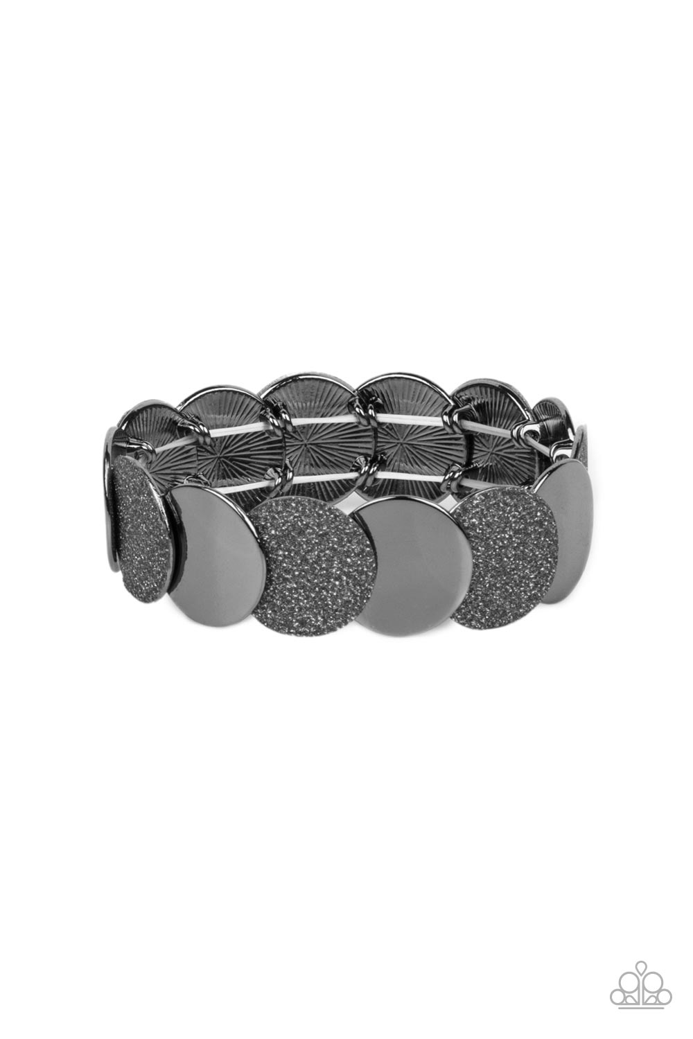 Demurely Disco - Black Item #P9BA-BKXX-089XX A glimmering collection of glistening gunmetal discs and glitter coated gunmetal discs delicately overlap along stretchy bands around the wrist, creating a dazzling hint of shimmer. Sold as one individual bracelet.