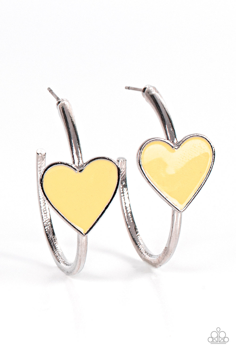 Kiss Up Yellow Hoop Earring - Paparazzi Accessories A charming Illuminating heart adorns the front of a classic silver hoop resulting in a whimsical fashion. Earring attaches to a standard post fitting. Hoop measures approximately 1 1/4" in diameter. All Paparazzi Accessories are lead free and nickel free! Sold as one pair of hoop earrings.
