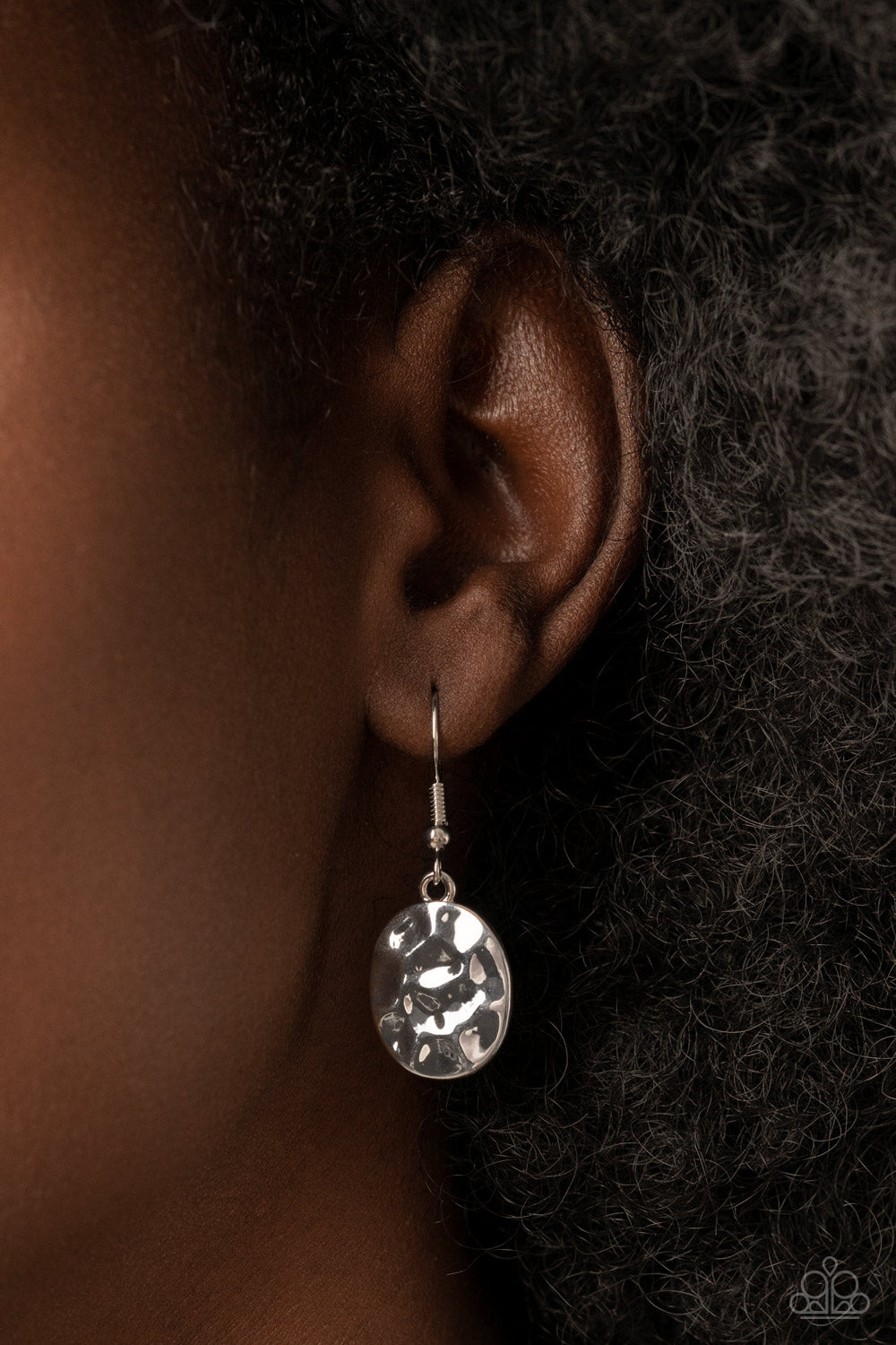 Rivera Rendezvous Green Necklace - Paparazzi Accessories Gradually increasing in size, hammered silver oval frames are dotted with opalescent Leprechaun beads as they delicately link below the collar for a refreshing pop of color. Features an adjustable clasp closure. Sold as one individual necklace. Includes one pair of matching earrings.