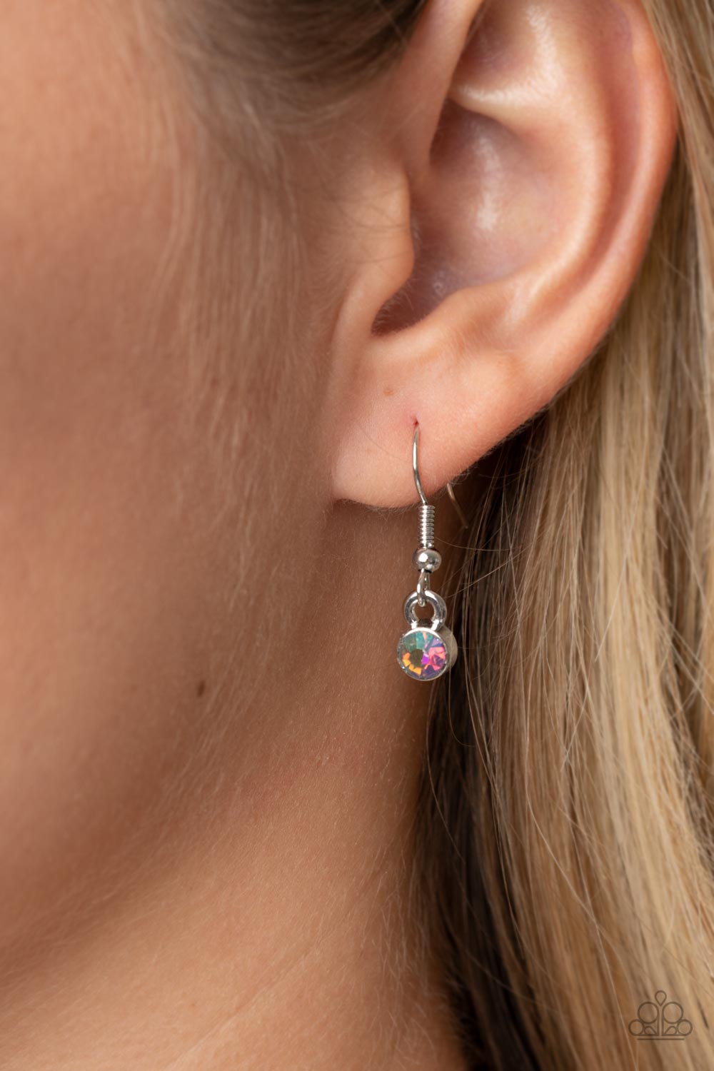 Cosmic Constellations Multi Necklace - Paparazzi Accessories Encased in sleek silver fittings, an oversized collection of UV geometric gems gradually increase in size as they link below the collar for a stellar statement. Features an adjustable clasp closure. Due to its prismatic palette, color may vary. Sold as one individual necklace. Includes one pair of matching earrings.