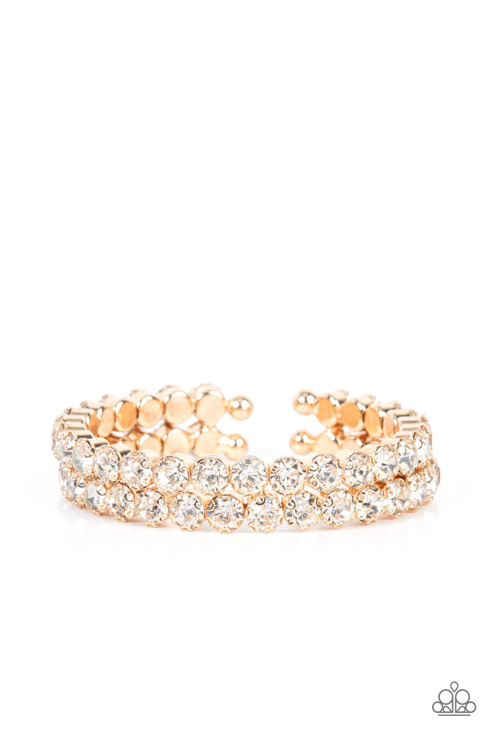 Megawatt Majesty Gold Cuff Bracelet - Paparazzi Accessories Encased in sleek gold fittings, two oversized rows of glassy white rhinestones stack into a blinding cuff around the wrist for a jaw-dropping look. Sold as one individual bracelet.