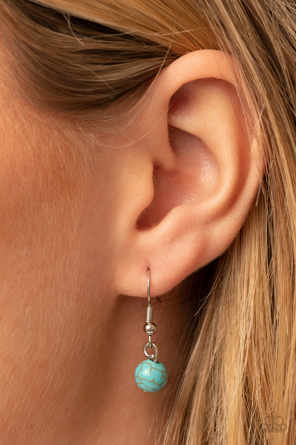 Winslow Wanderer - Blue Item #P2SE-BLXX-435XX Strips of brown leather fan out from the bottom of a round turquoise stone that is threaded along a metal rod that attaches to the bottom of a silver horseshoe frame. The earthy pendant swings from the bottom of an extended silver chain, resulting in a wildly wonderful tassel. Features an adjustable clasp closure. Sold as one individual necklace. Includes one pair of matching earrings.