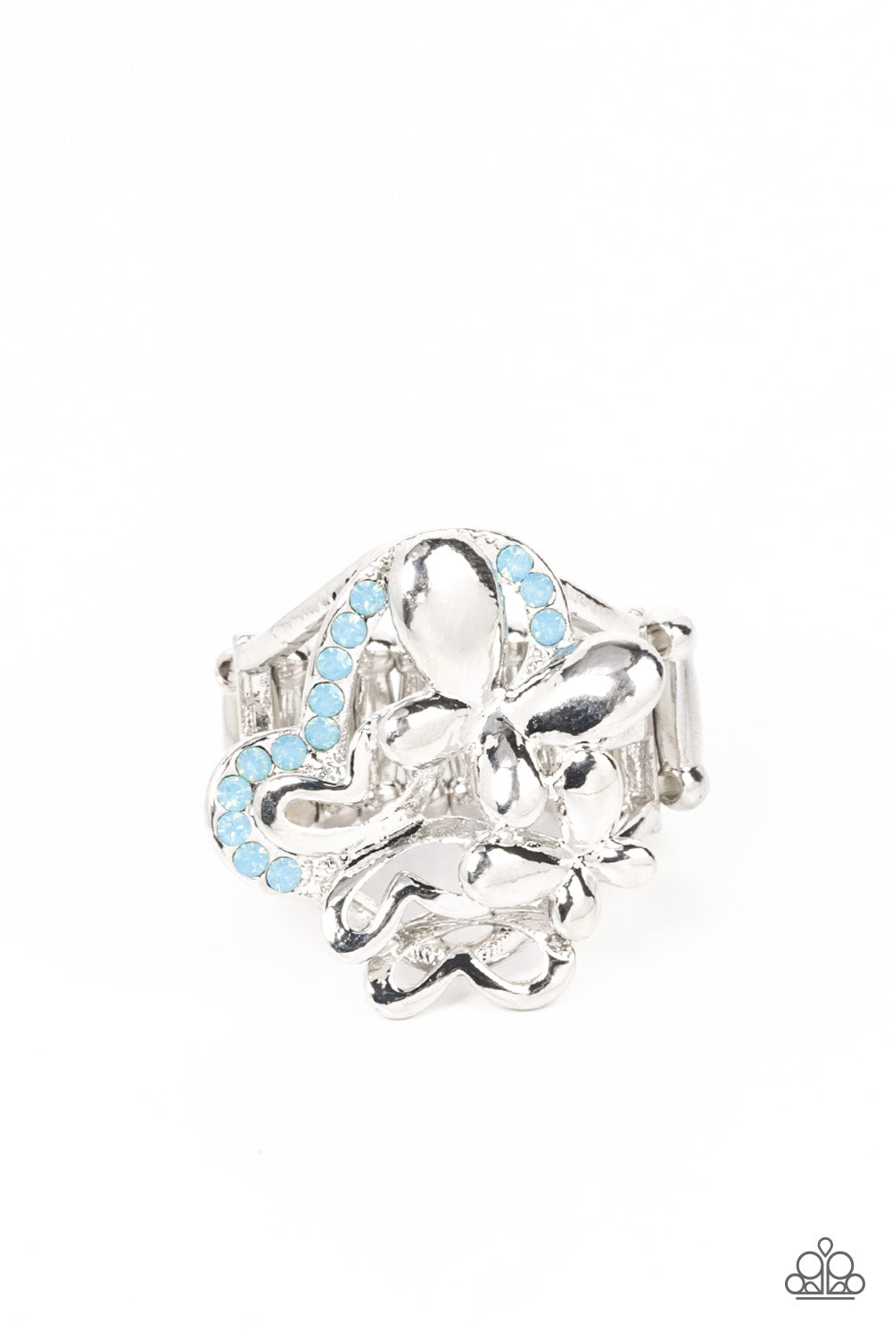 Fluttering Flashback Blue Ring - Paparazzi Accessories Enhanced with blue opal rhinestones, a shiny collection of mismatched silver butterfly frames flutters atop the finger, resulting in a whimsical bouquet. Features a stretchy band for a flexible fit. Sold as one individual ring.