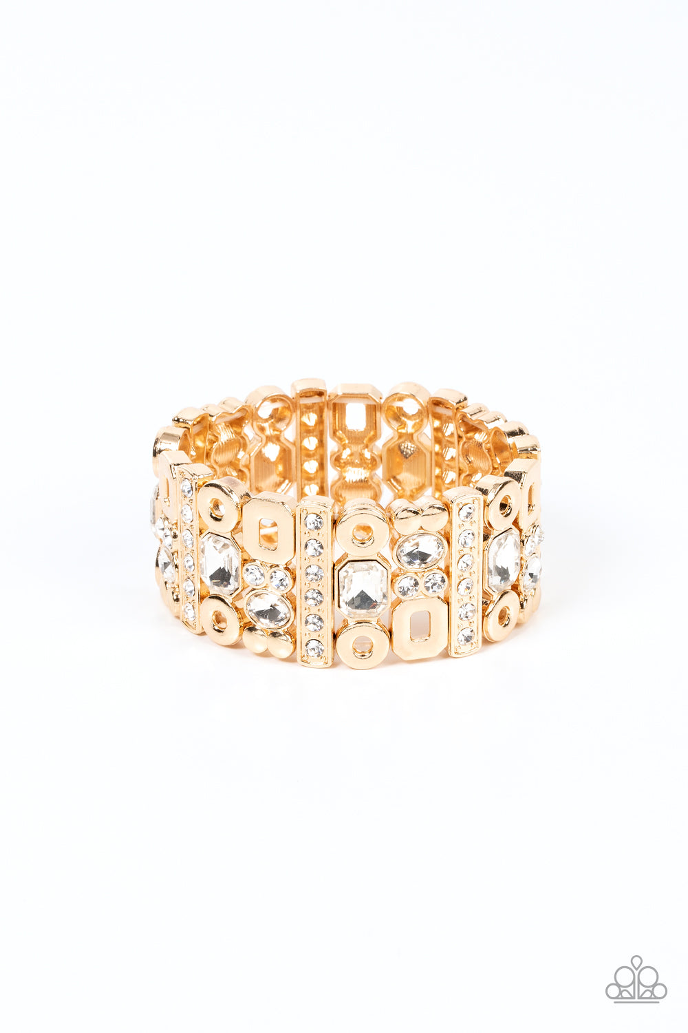 Dynamically Diverse Gold Bracelet - Paparazzi Accessories Infused with flat gold studs and geometric gold accents, a mismatched assortment of oval, round, and emerald style white rhinestones coalesce into edgy frames along a stretchy band for an intense sparkle around the wrist. Sold as one individual bracelet.