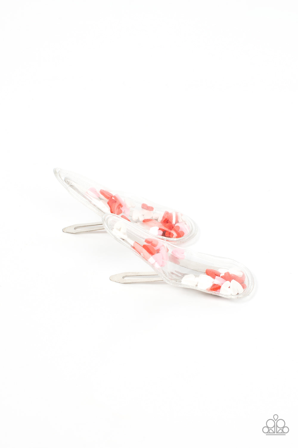 What a Sweetheart Multi Hair Clip - Paparazzi Accessories A flirtatious collection of red, white, and pink hearts flutter back and forth inside a clear plastic frame, creating a charming eye-catching pop of color. Features standard snap hair clips on the back. Sold as one pair of hair clips.