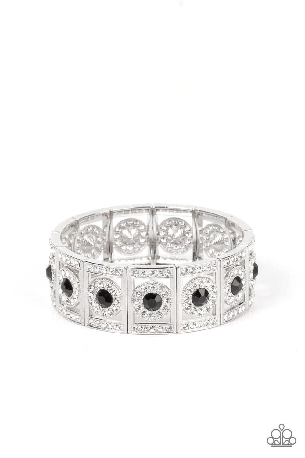 Ultra Upscale Black Bracelet - Paparazzi Accessories A glassy black rhinestone is pressed into a ring of glitzy white rhinestones inside a rectangular silver frame dusted in dazzling white rhinestones. The timeless frames sparkle along stretchy bands around the wrist, resulting in a glamorously glittering centerpiece. Sold as one individual bracelet.
